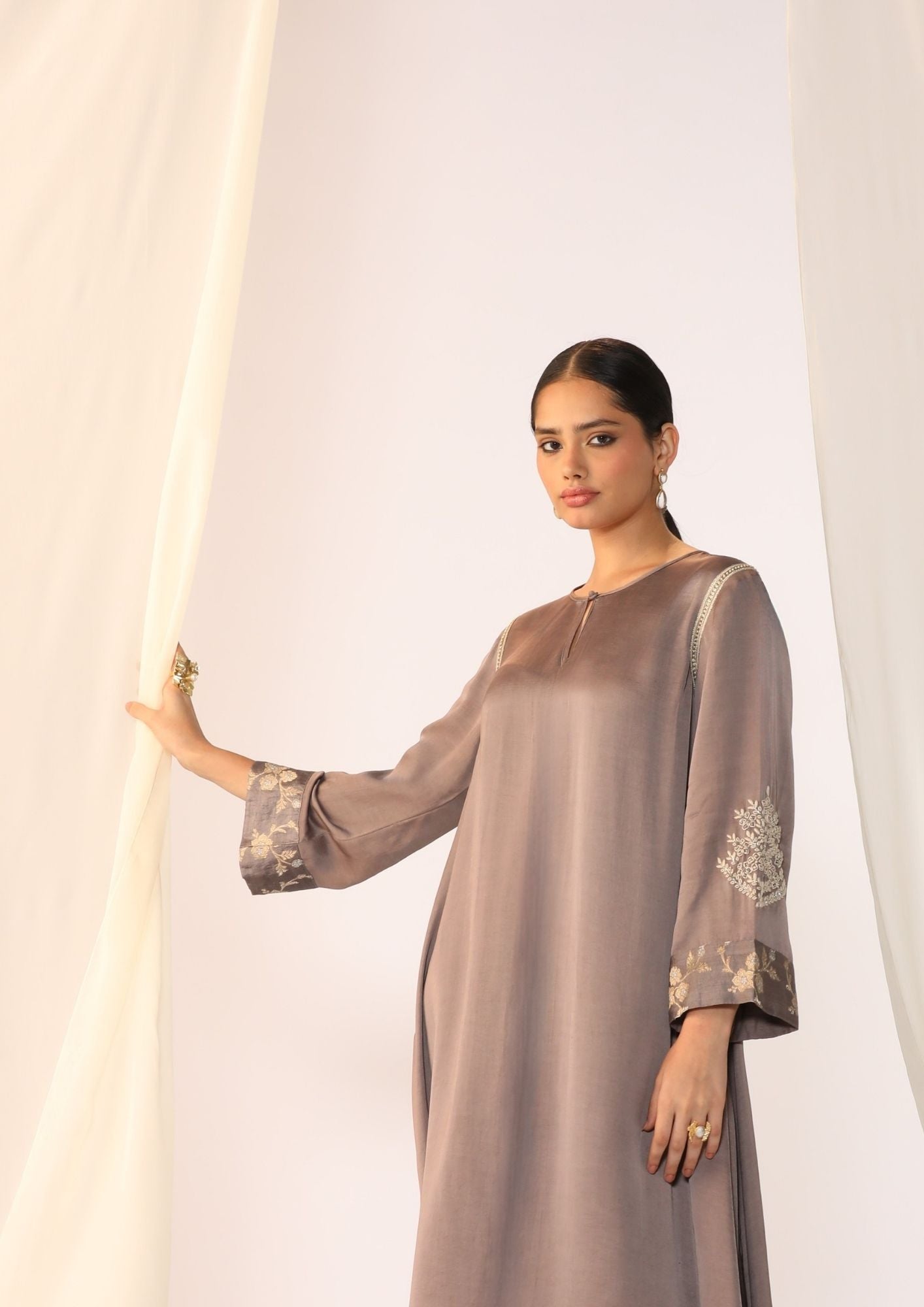 Linen Satin Keyhole Kurta With Delicate Handwork Paired With Slim Pants