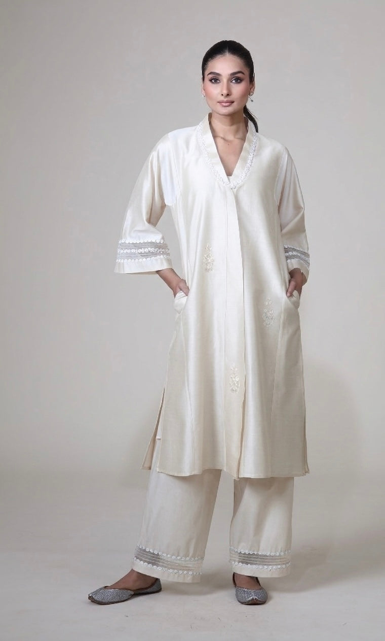 https://cdn.shopify.com/s/files/1/0585/9495/1341/files/Ambreen_ivory_front_jpg.jpg?v=1773037189