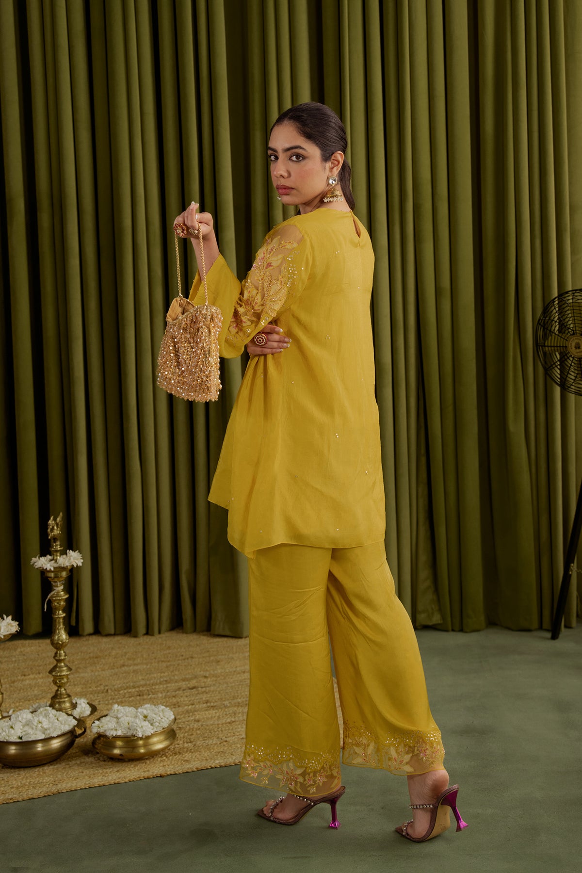 Mango co-ord set with embroidered magnolia flower pattern.