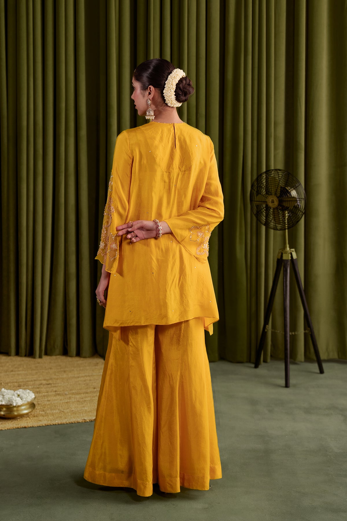 Golden Yellow Kurta set in viscose silk base with intricately hand embroidered yoke and booti design.