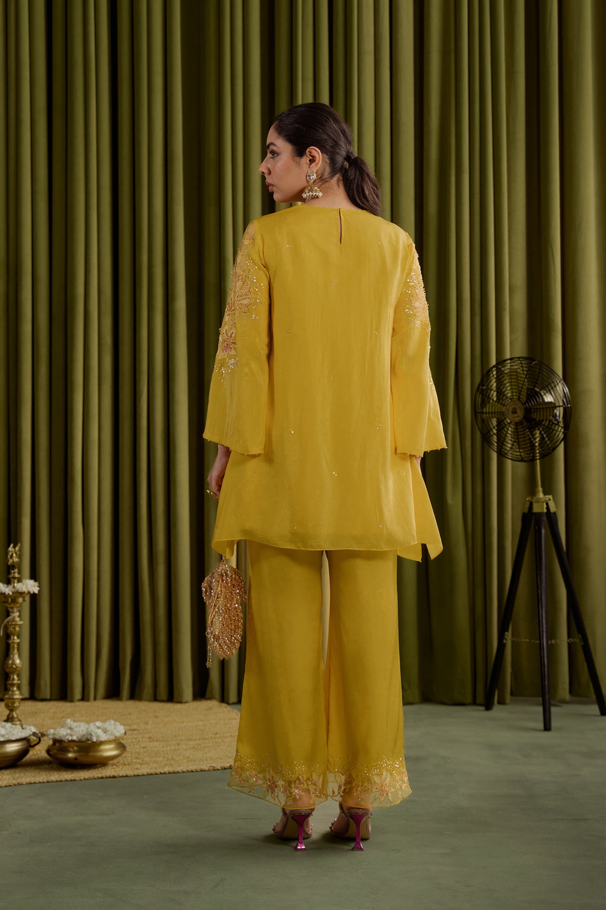 Mango co-ord set with embroidered magnolia flower pattern.