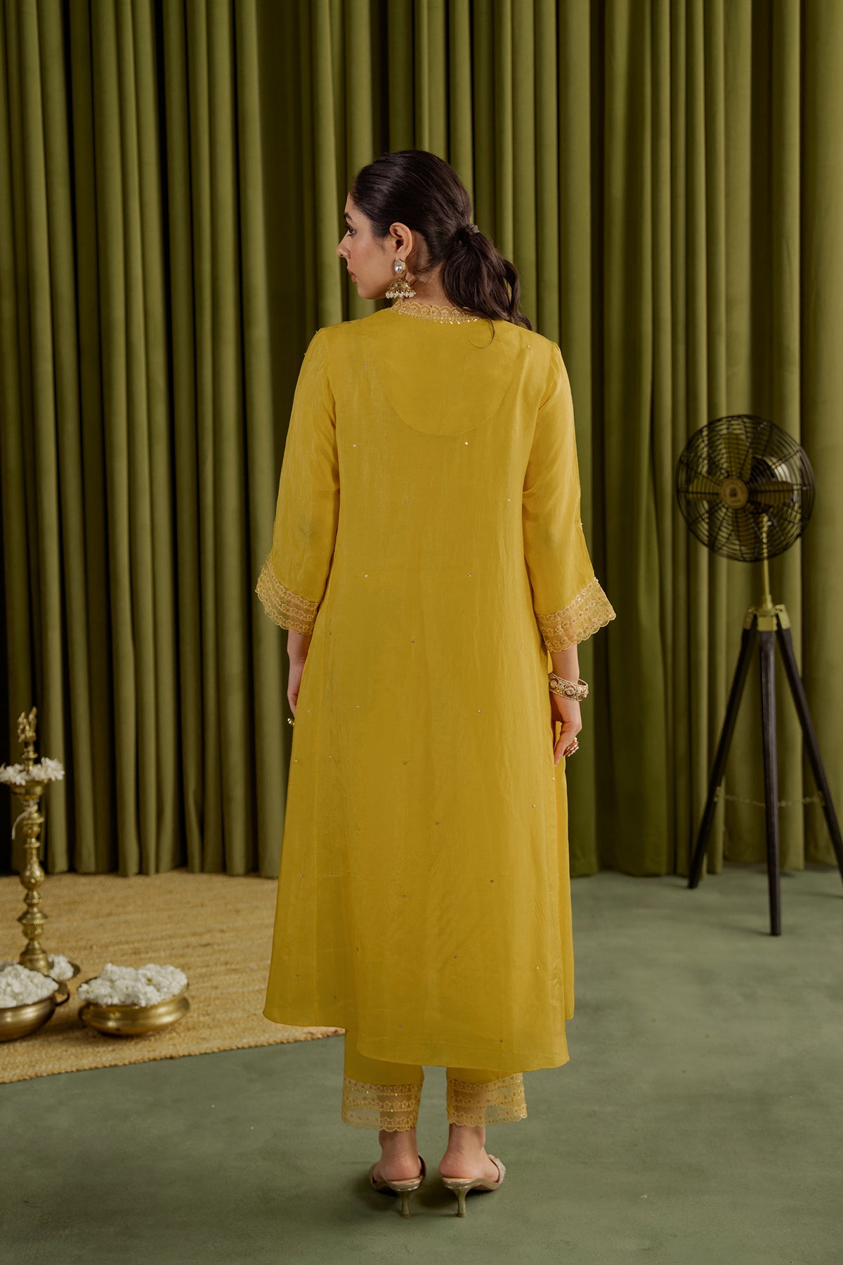 Mango kurta set with delicate floral embroidery.