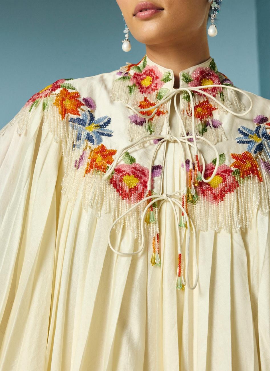 IVORY PLEATED DRESS WITH FLORAL CAPE