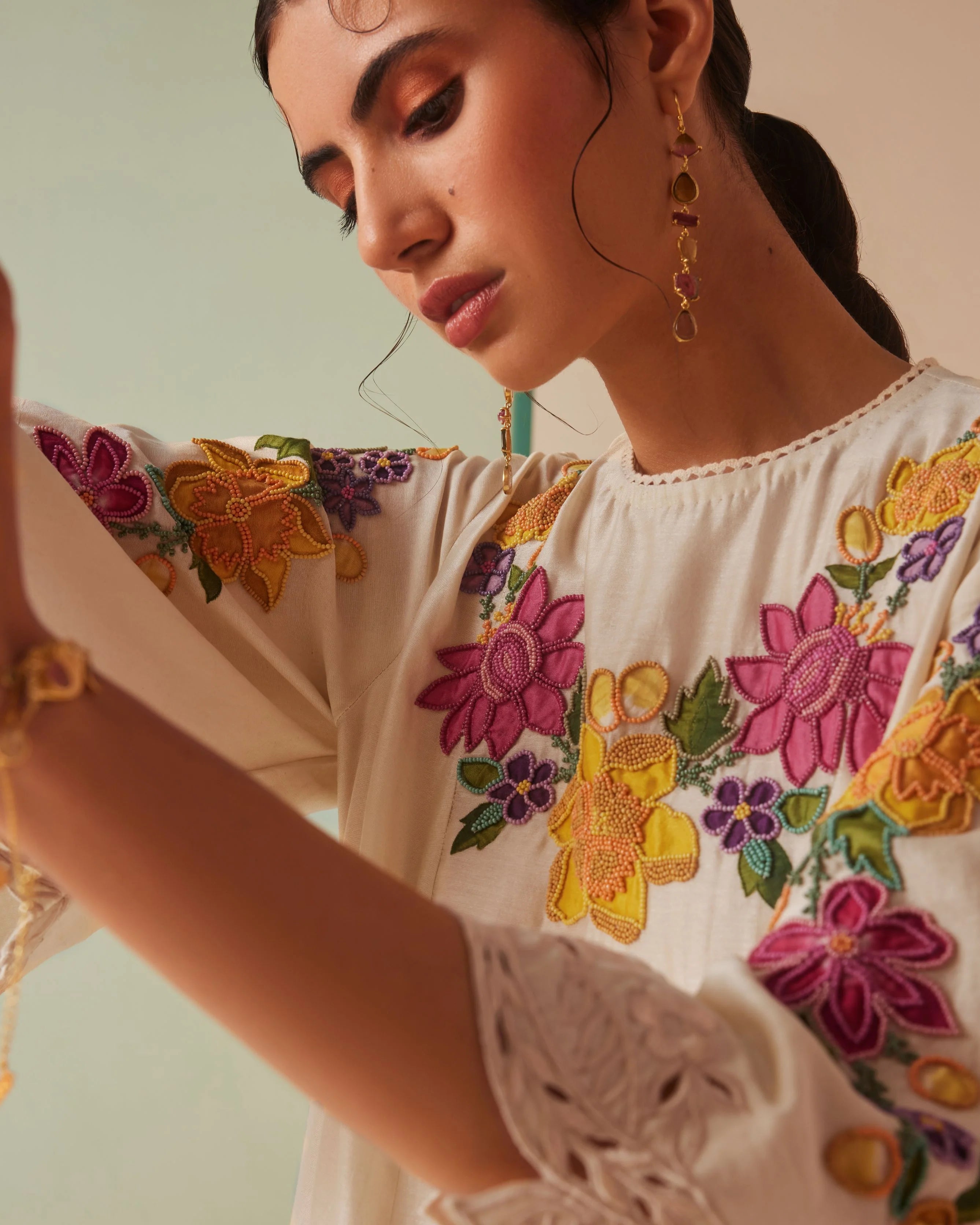 IVORY APPLIQUE AND CUTWORK FLARED KURTA WITH NARROW CUTWORK PANTS