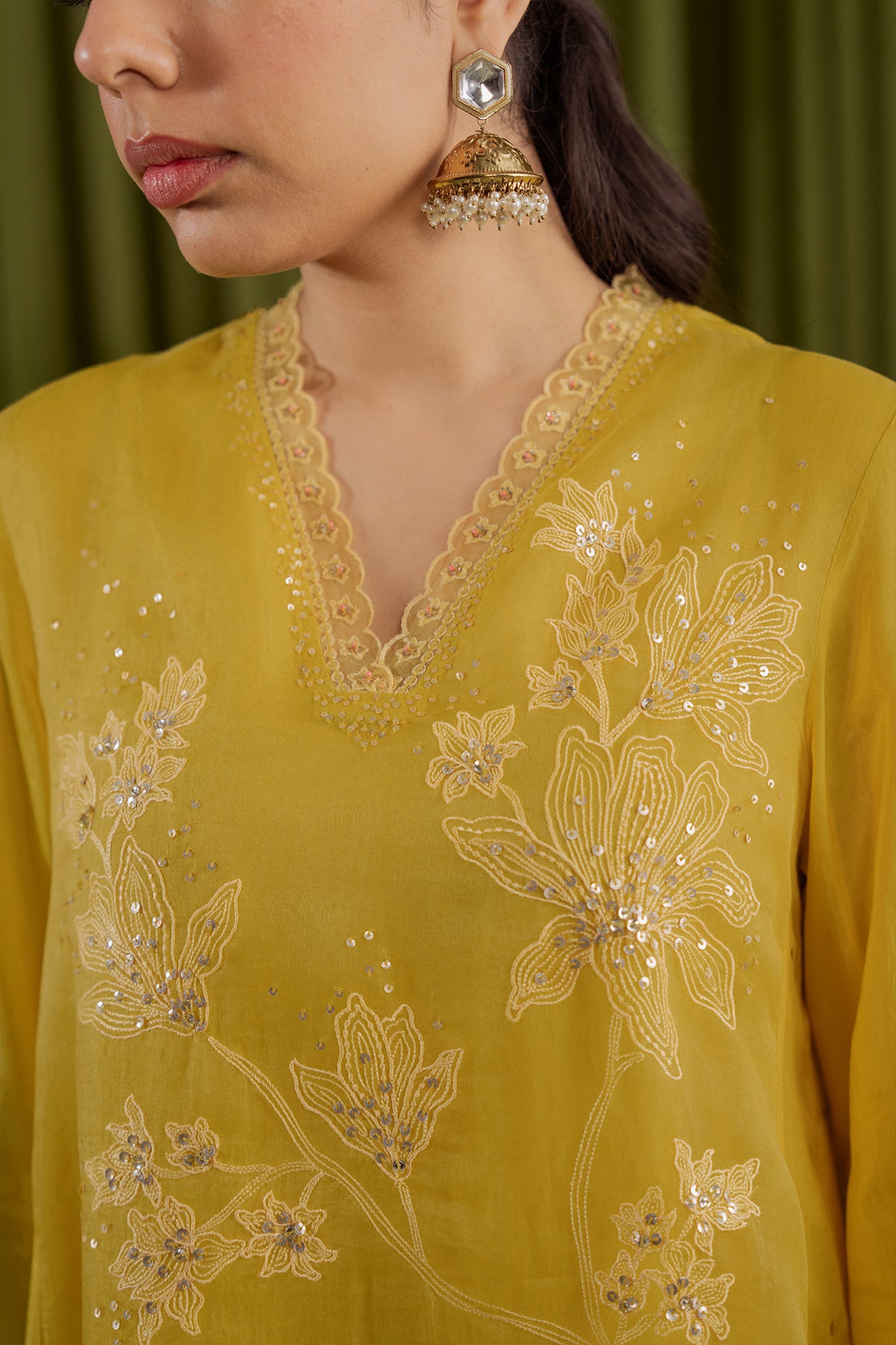 Mango kurta set with delicate floral embroidery.