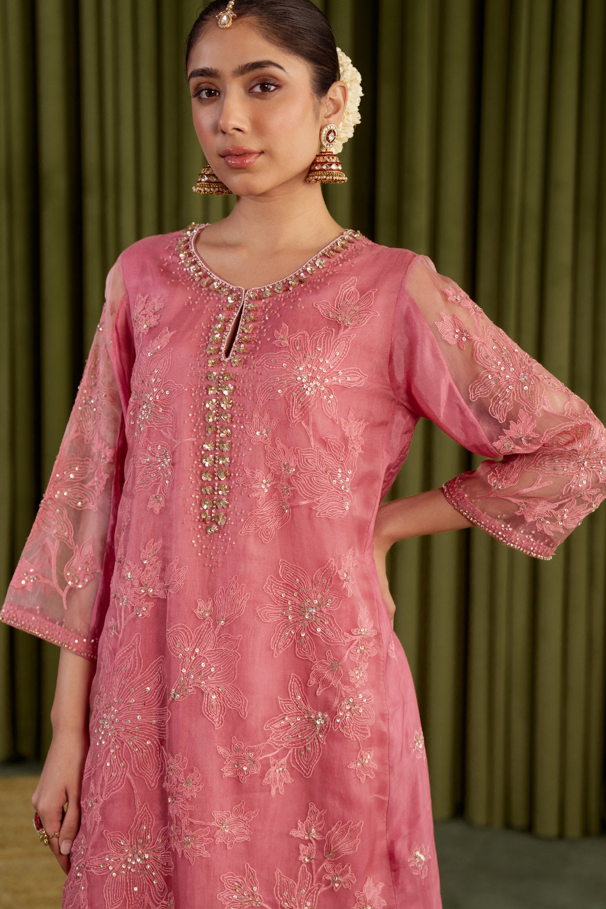 Rose pink kalidar kurta set with delicate floral embroidery.