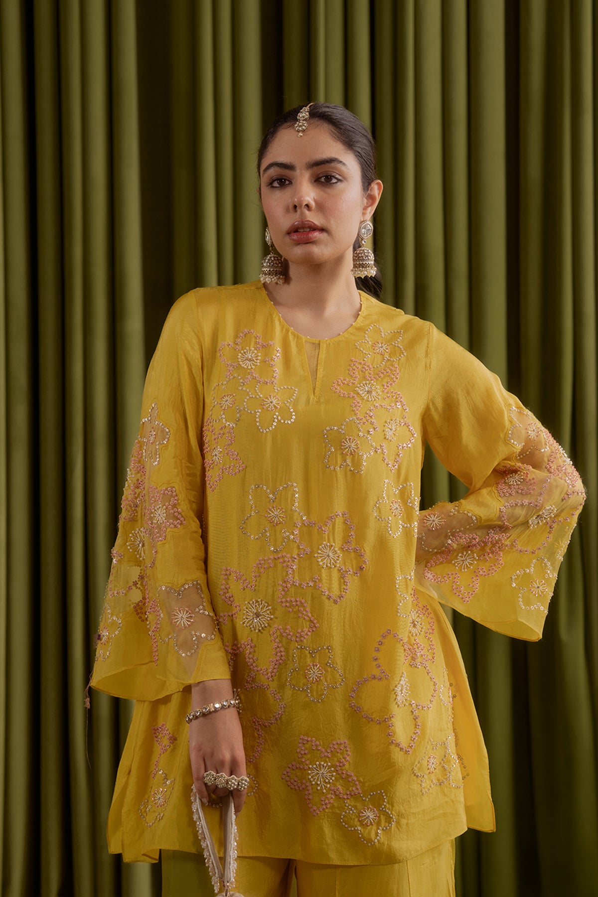 Mango sharara set with hand embroidered floral pattern.