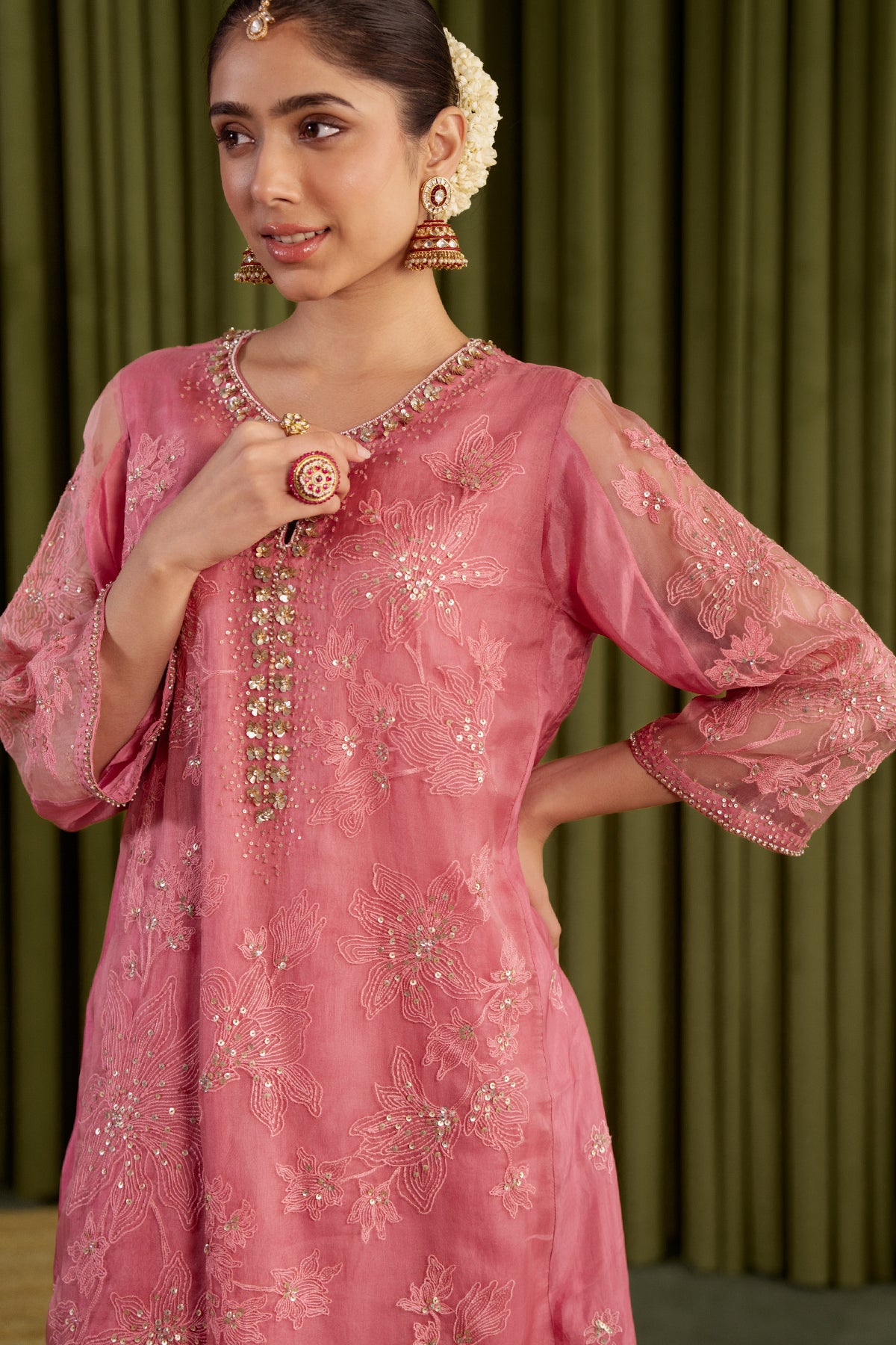 Rose pink kalidar kurta set with delicate floral embroidery.