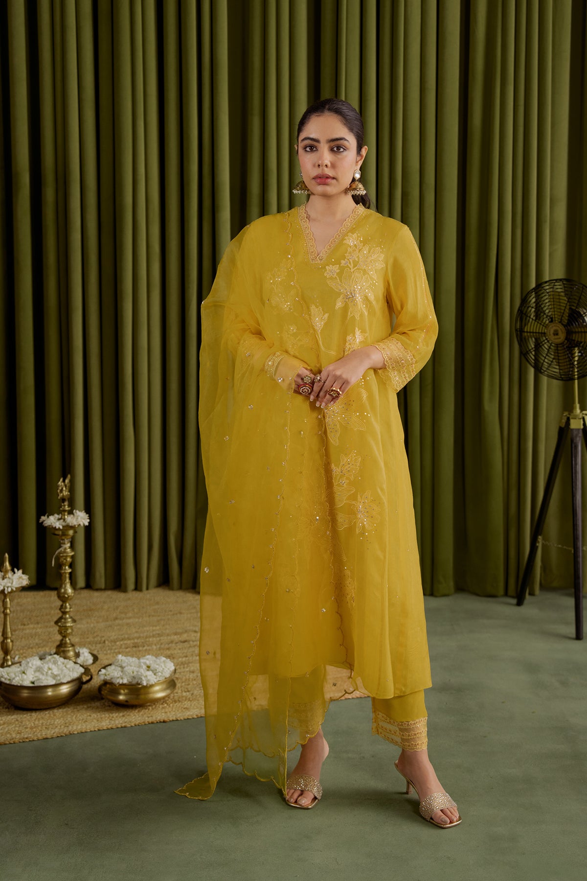 Mango kurta set with delicate floral embroidery.