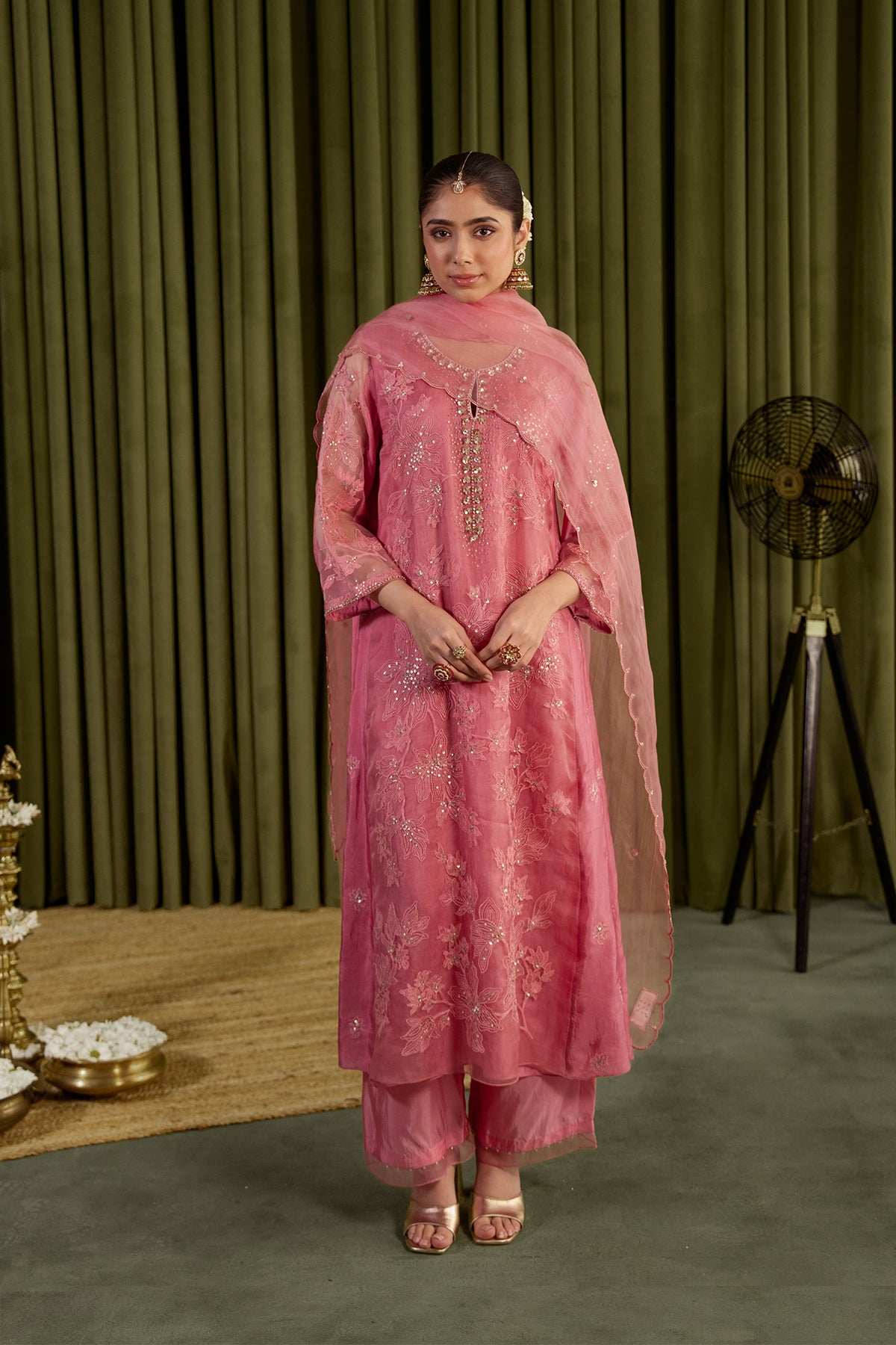 Rose pink kalidar kurta set with delicate floral embroidery.