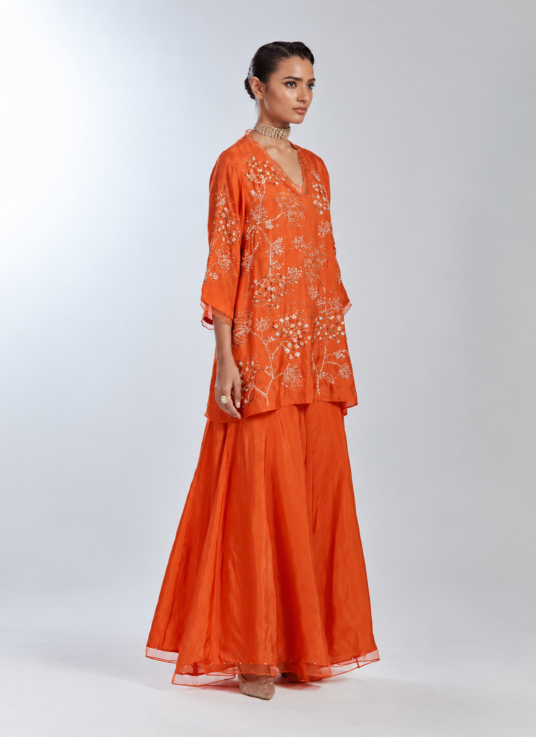 Poppy color sharara set in silk with intricate floral hand embroidery