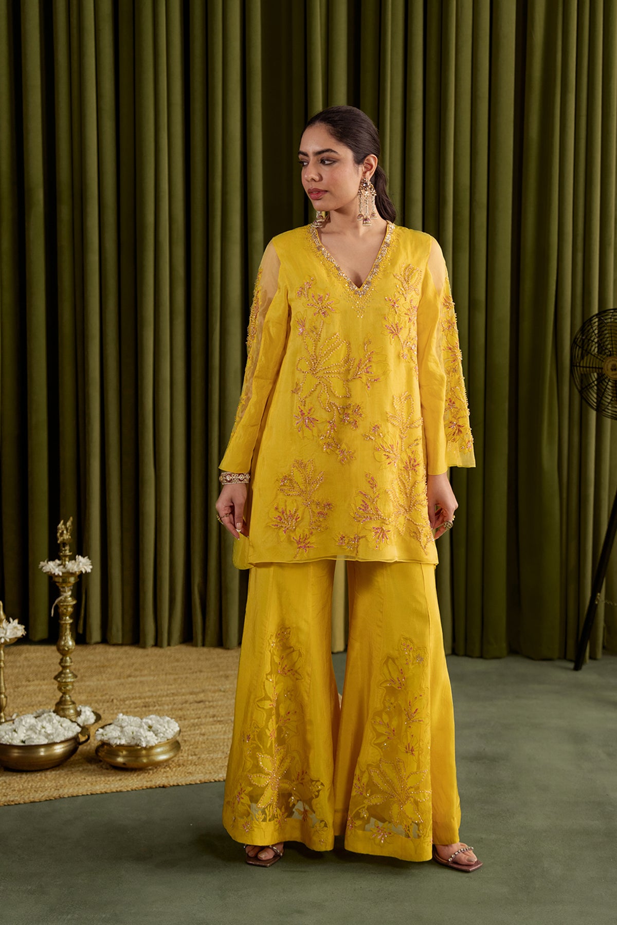 Mango sharara set with embroidered magnolia flower pattern.