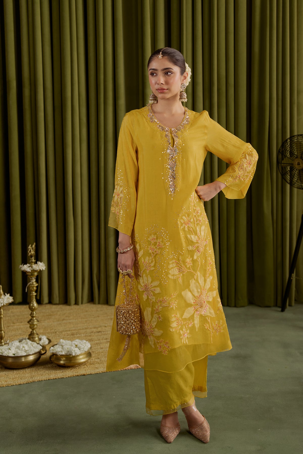 Mango kurta set in viscose silk base with embroidered magnolia flower pattern.