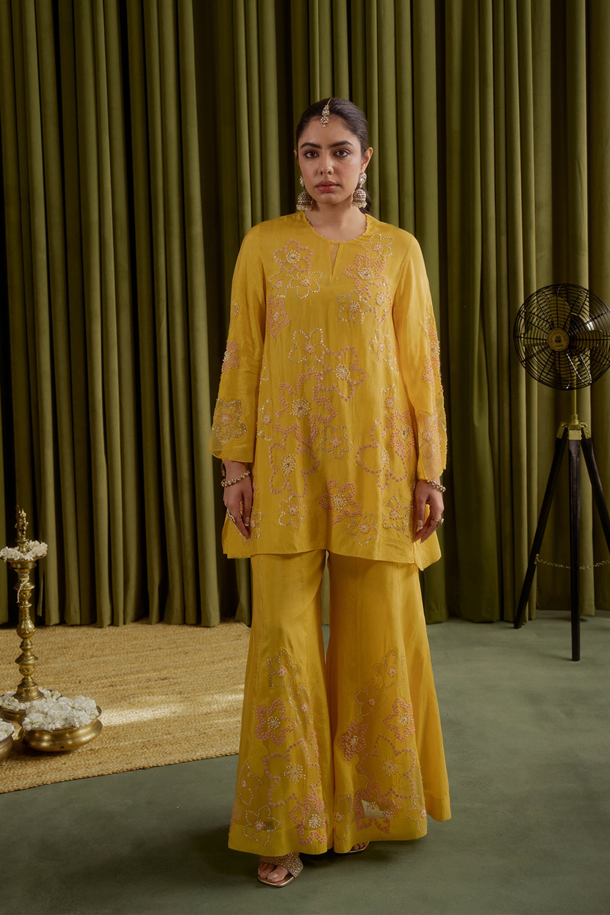 Mango sharara set with hand embroidered floral pattern.