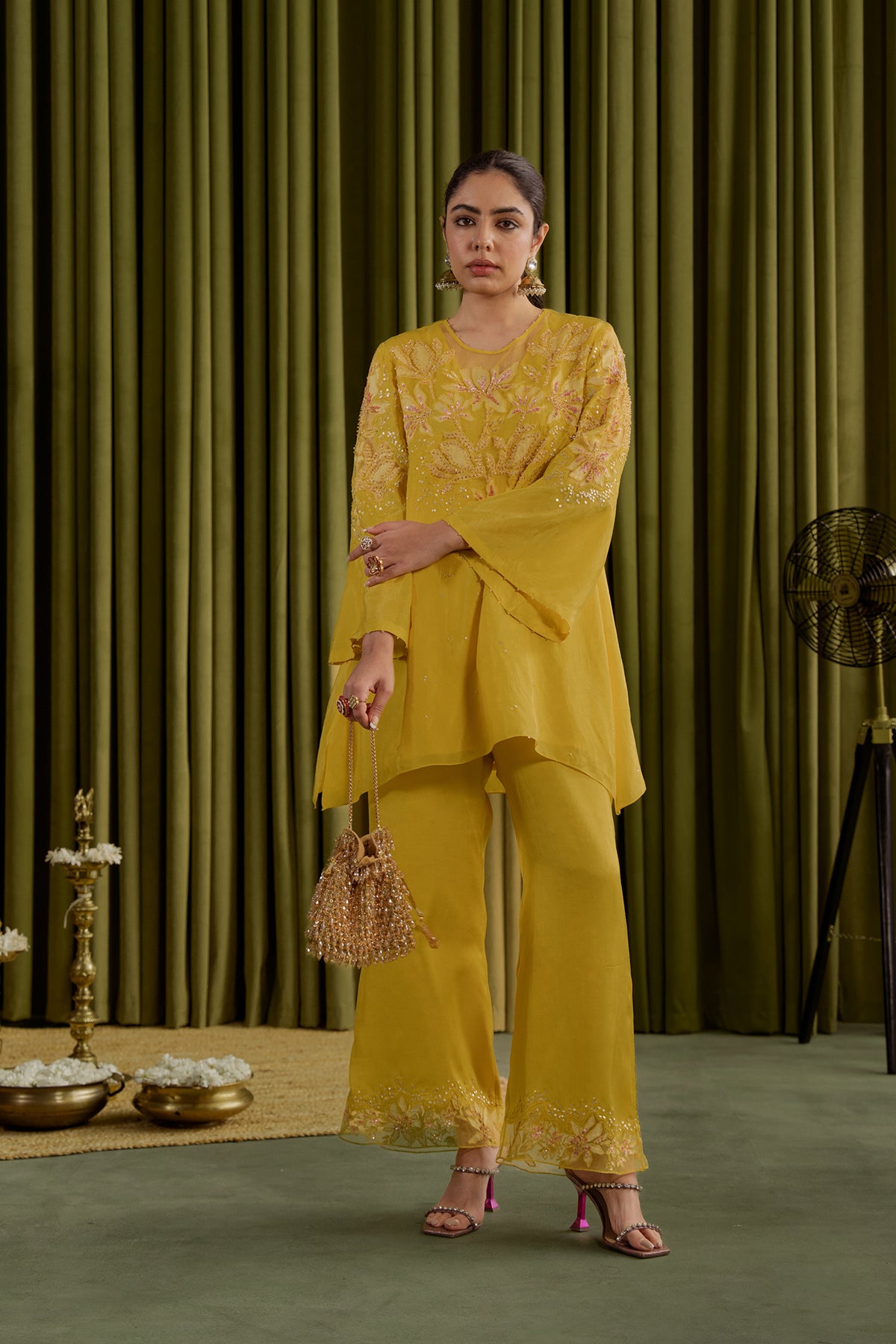 Mango co-ord set with embroidered magnolia flower pattern.