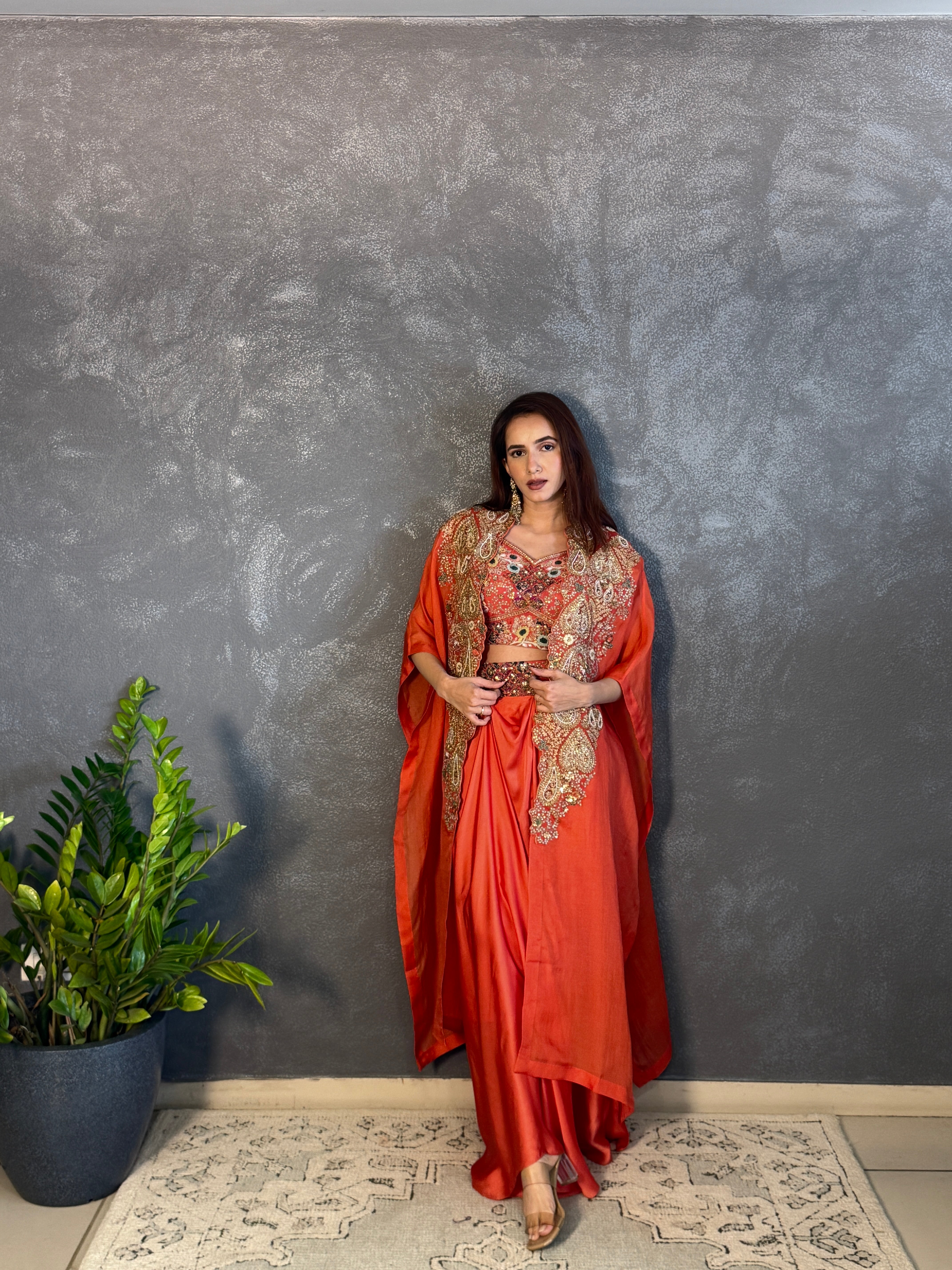Gulrez cape with embroidered bustier & draped skirt