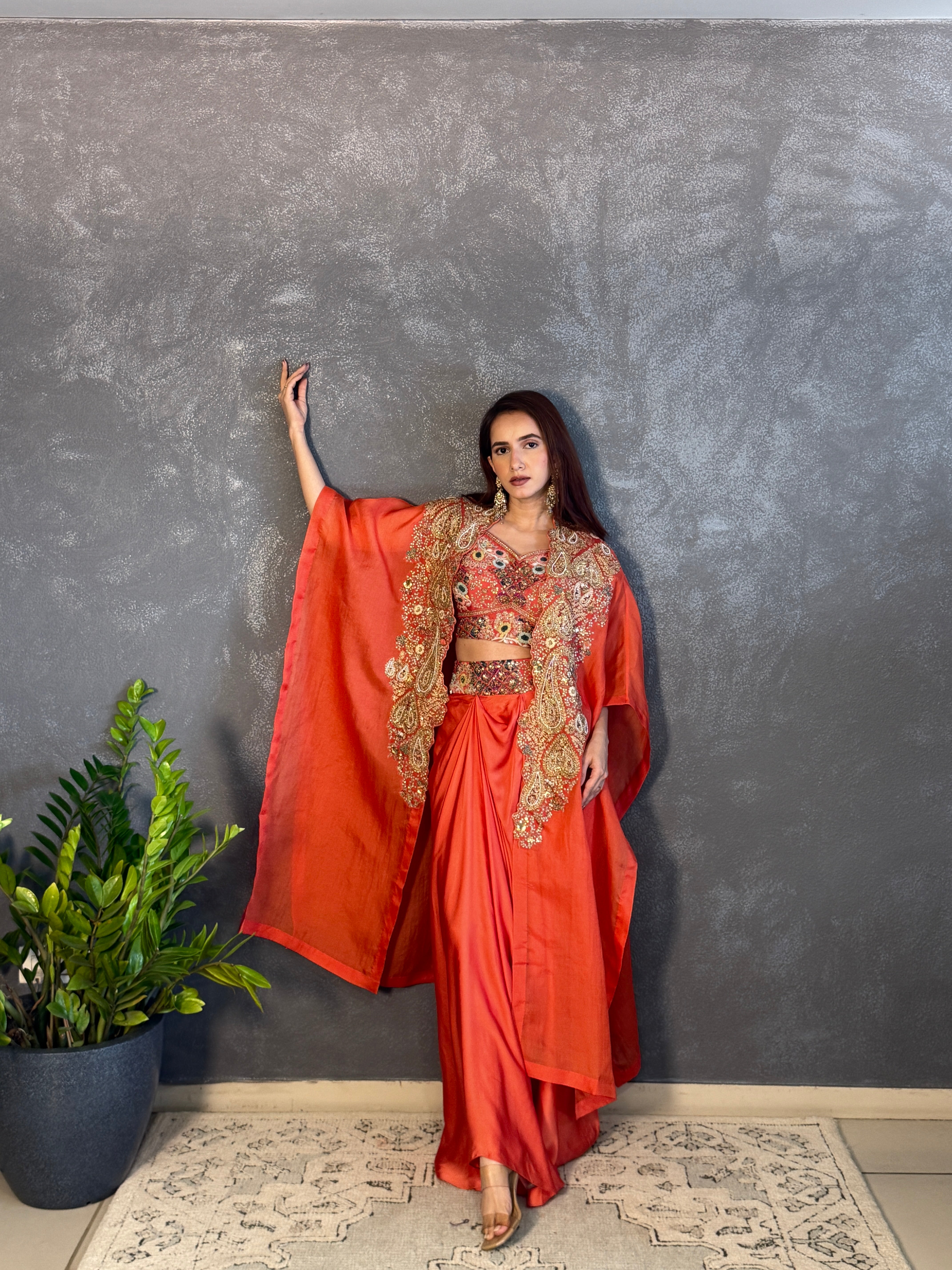 Gulrez cape with embroidered bustier & draped skirt
