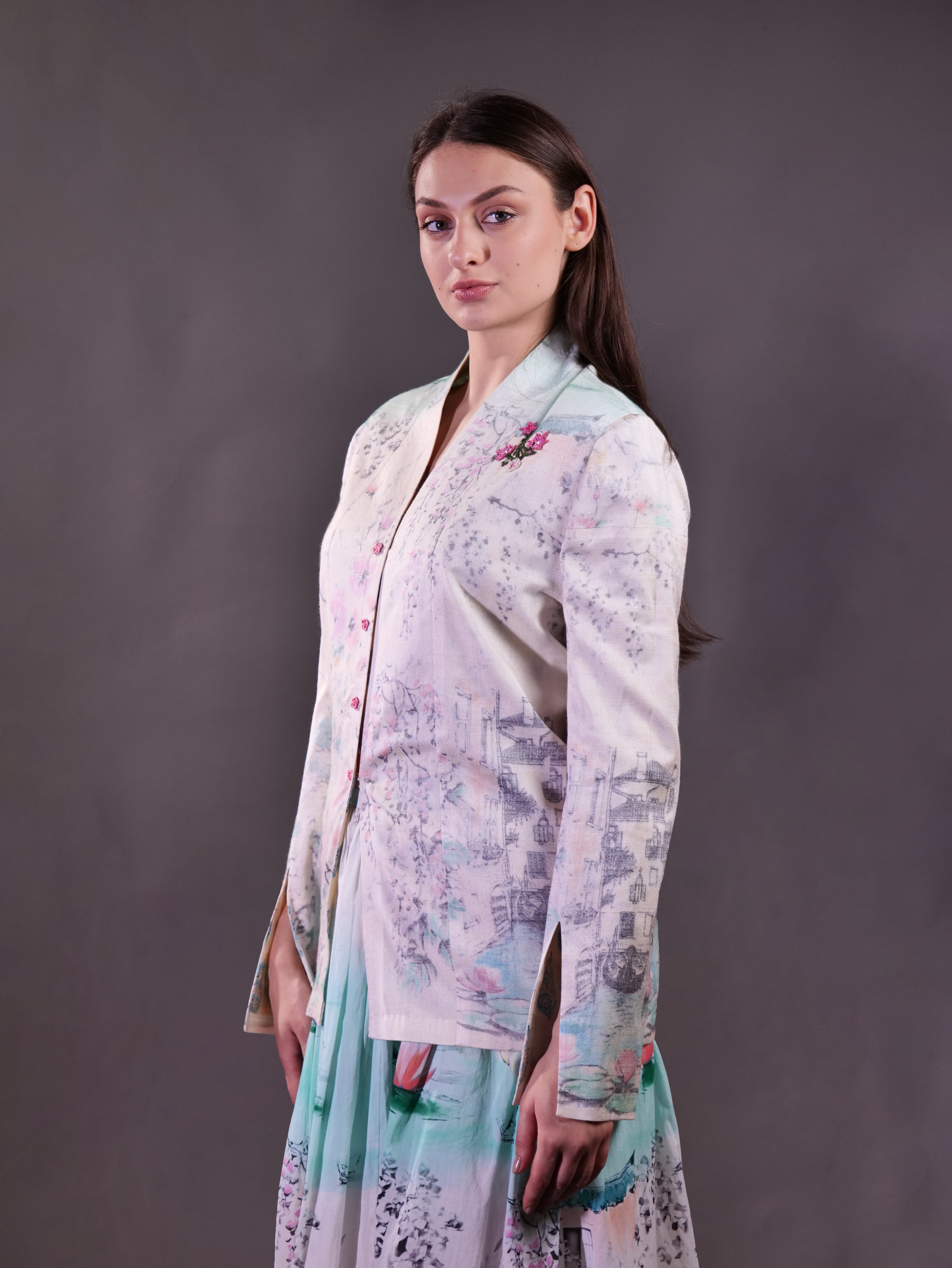 Matka Silk Printed Jacket wth embroidery highlight paired with printed cotton skirt