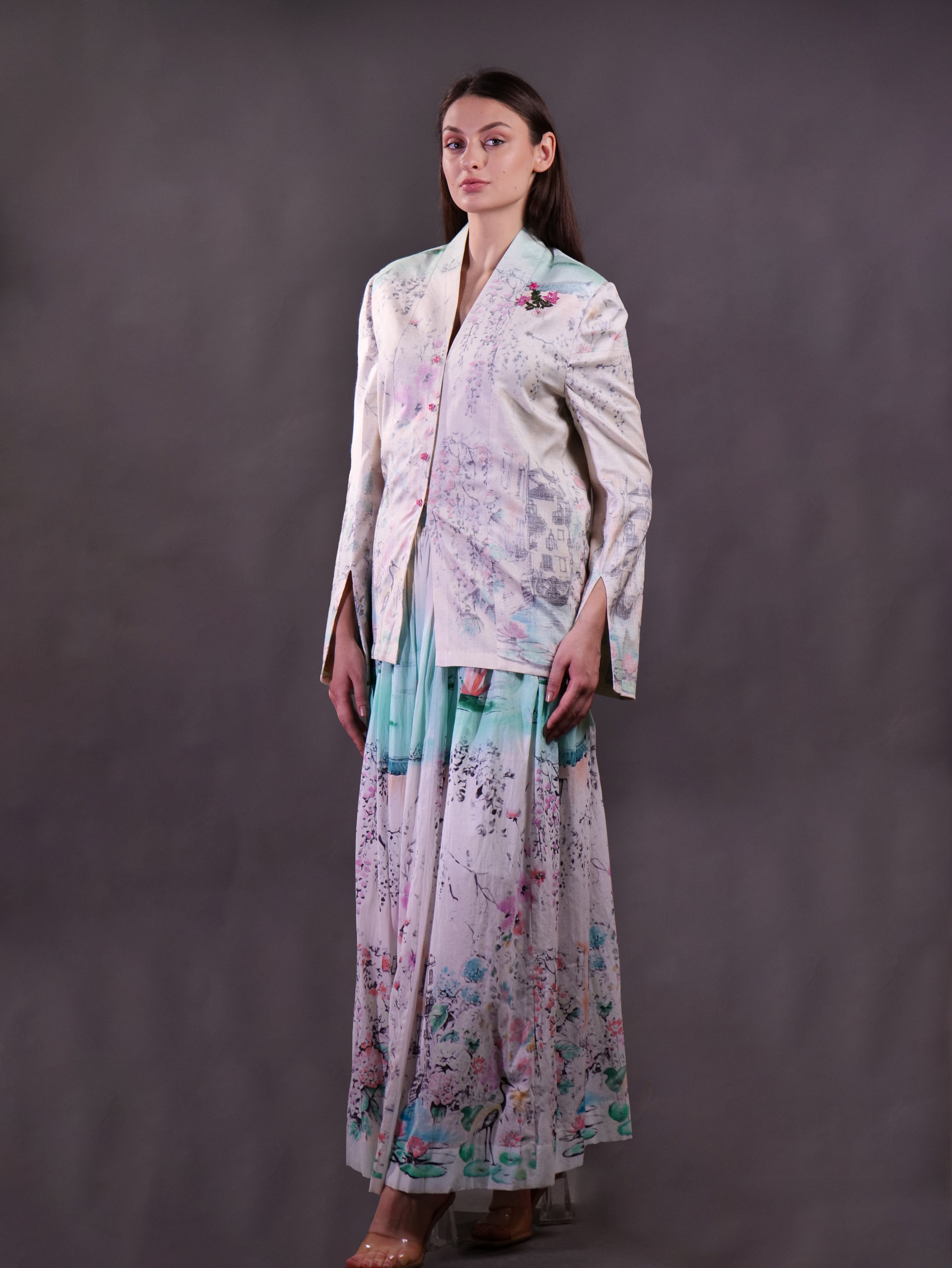 Matka Silk Printed Jacket wth embroidery highlight paired with printed cotton skirt