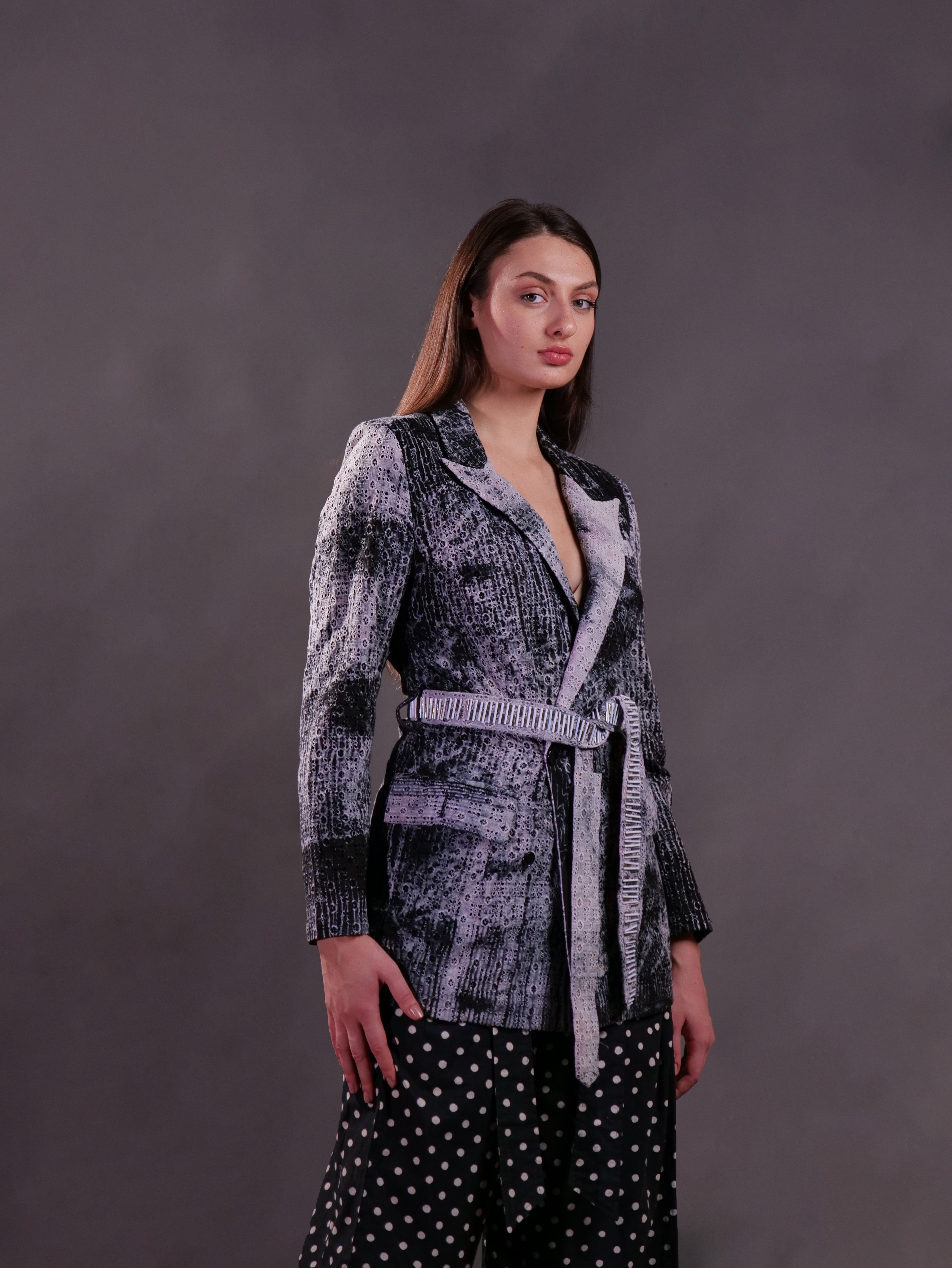 Schiffli cotton Shibori Shacket with hand embroidery highlight waist belt and block printed polka trousers