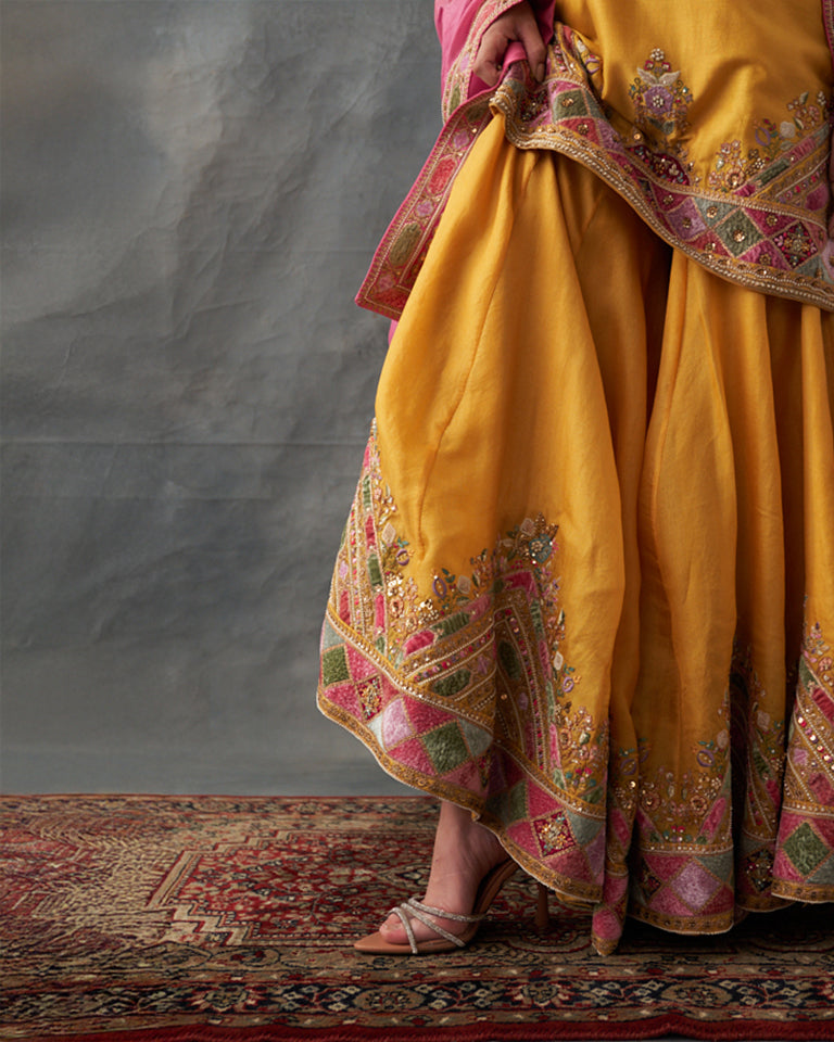 Velvet patchwork short kurta with Sharara pants & dupatta.