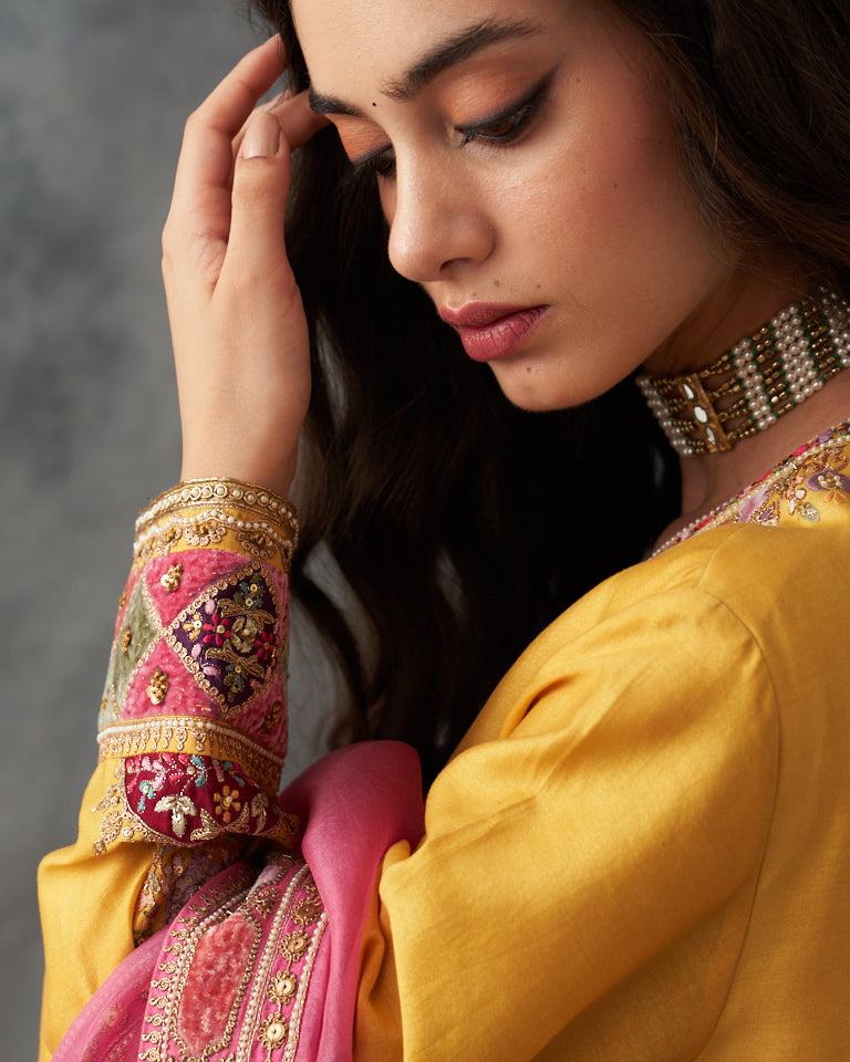 Velvet patchwork short kurta with Sharara pants & dupatta.