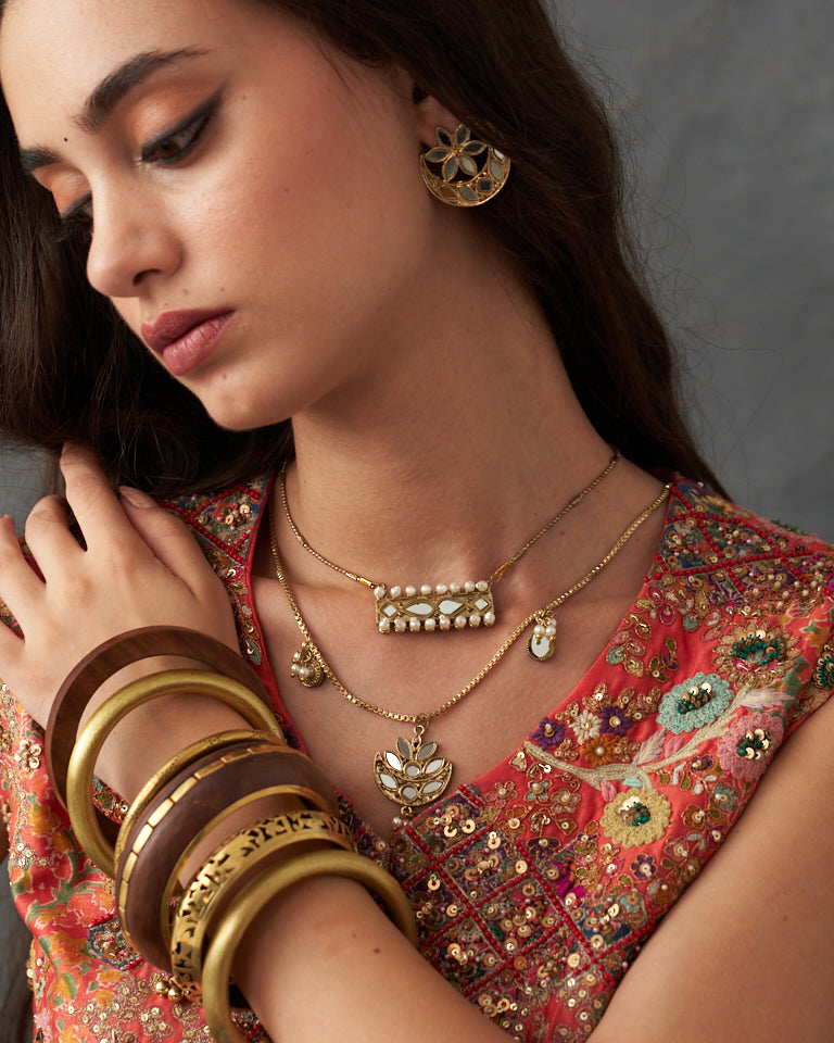 Gulrez short jacket with cape & embroidered sharara set.
