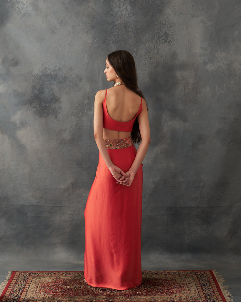 Gulrez cape with embroidered bustier & draped skirt.