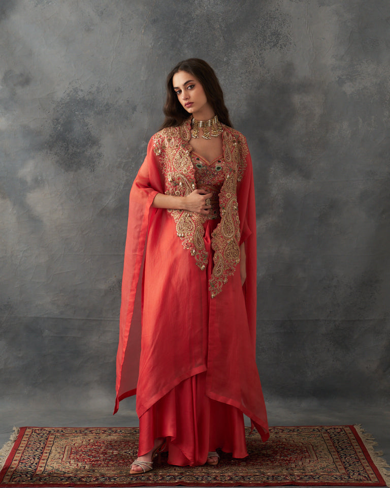 Gulrez cape with embroidered bustier & draped skirt.