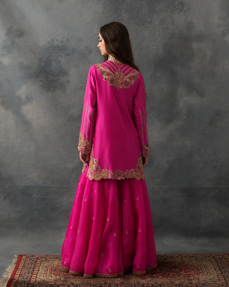 Gulrez short kurti with sharara & dupatta.