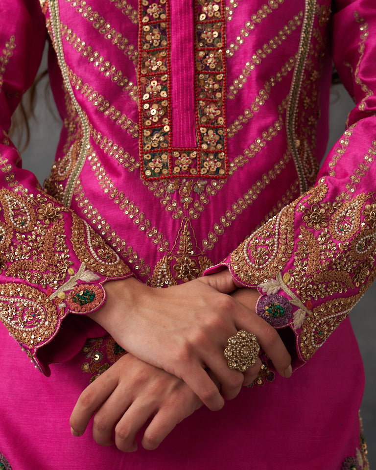 Gulrez short kurti with sharara & dupatta.