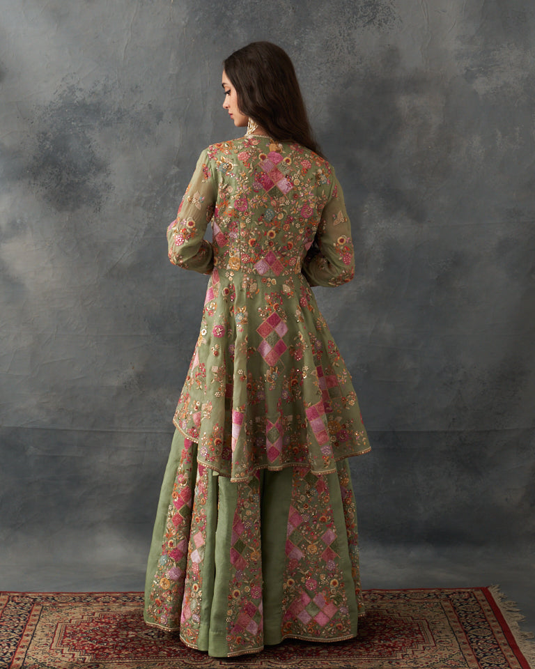 Velvet patchwork Peplum with heavy embroidered sharara.