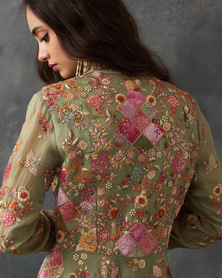Velvet patchwork Peplum with heavy embroidered sharara.