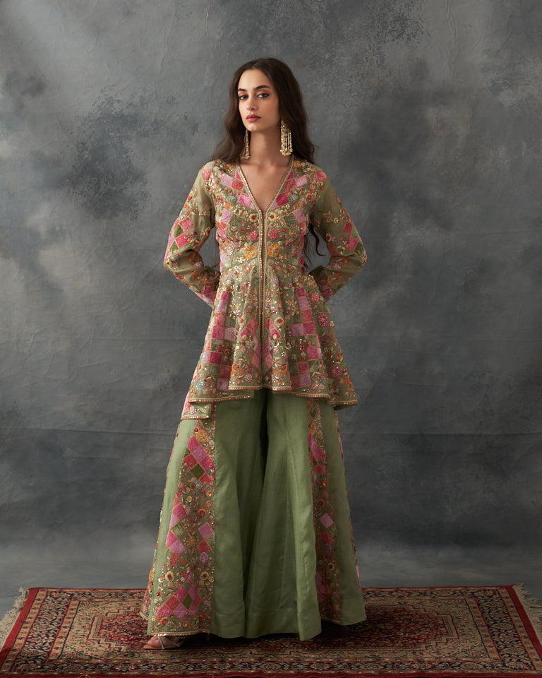 Velvet patchwork Peplum with heavy embroidered sharara.