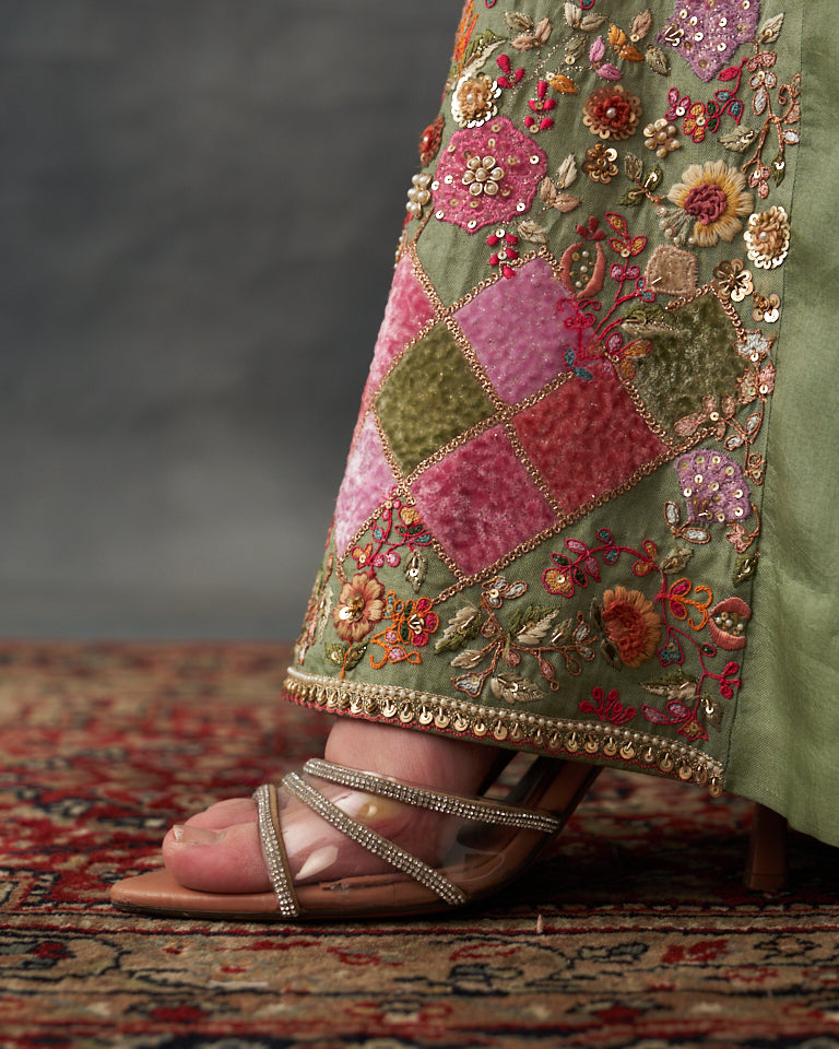 Velvet patchwork Peplum with heavy embroidered sharara.