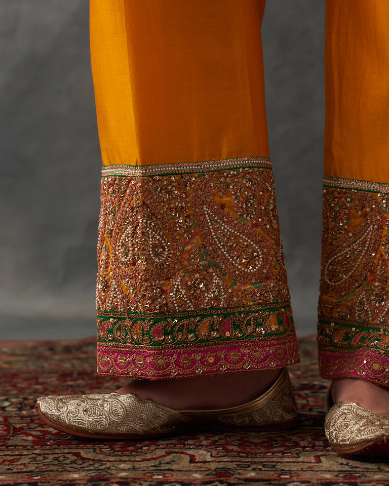 Gulrez short kurti with straight cut pants.