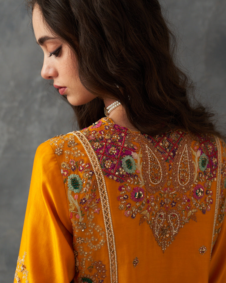 Gulrez short kurti with straight cut pants.
