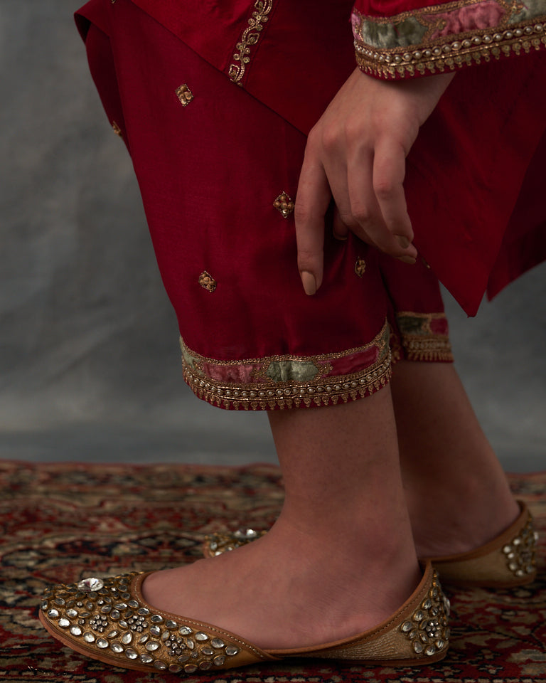 Velvet patchwork Asymetrical Kurta with embroidered pants.