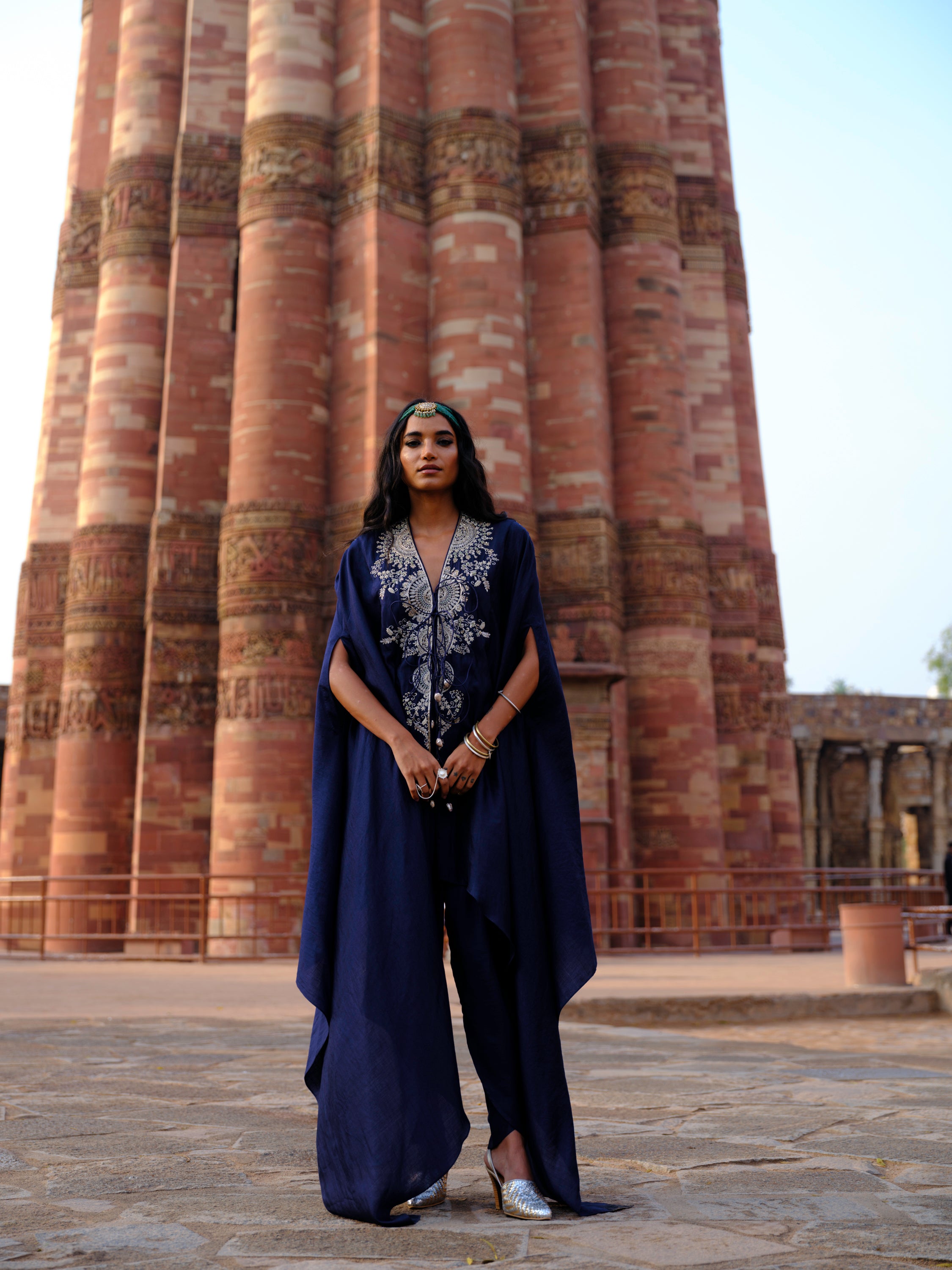 Featuring a cape in silk base with zardosi embroidery