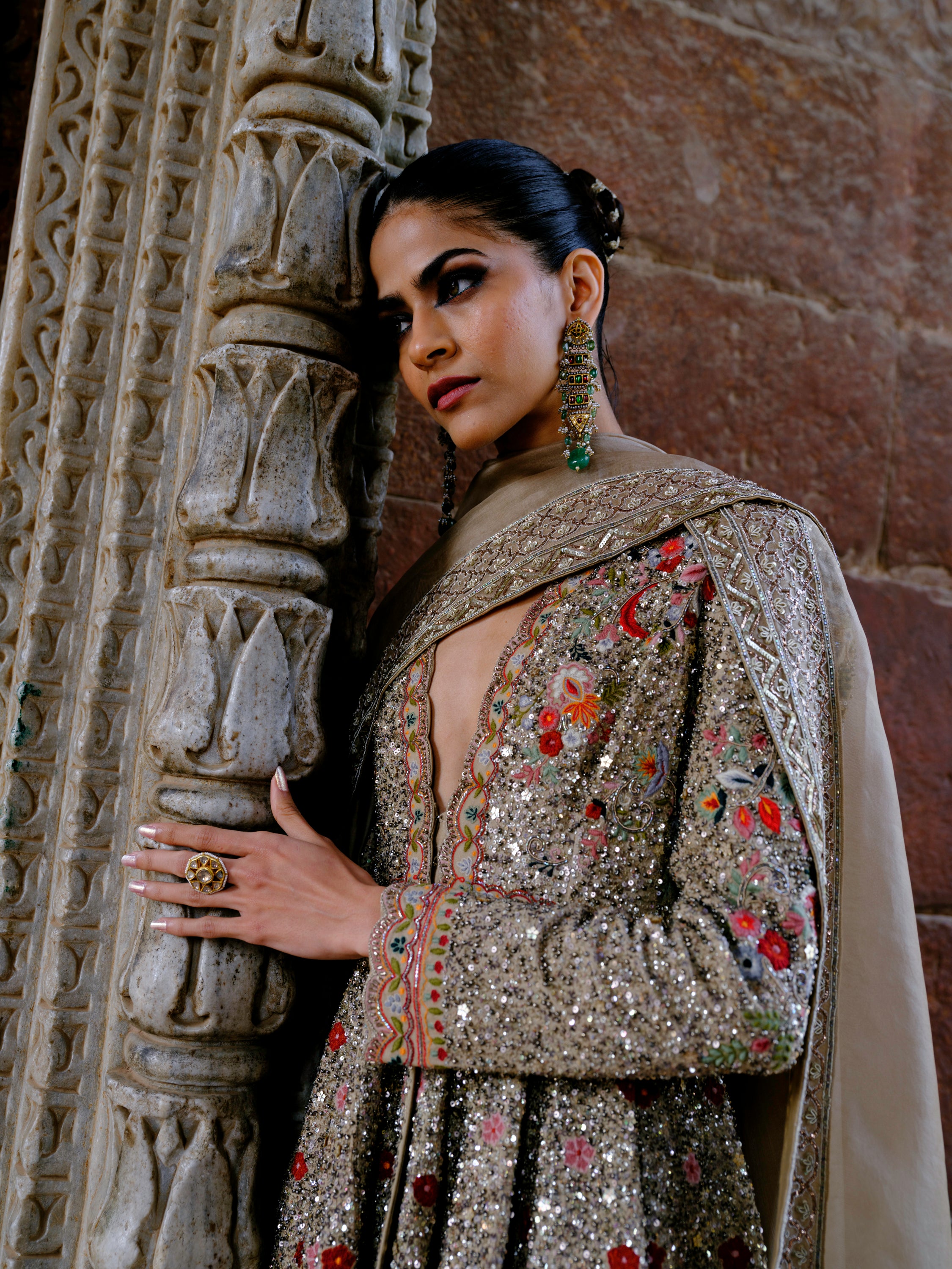 Featuring a peplum in georgette base with zardosi embroidery.