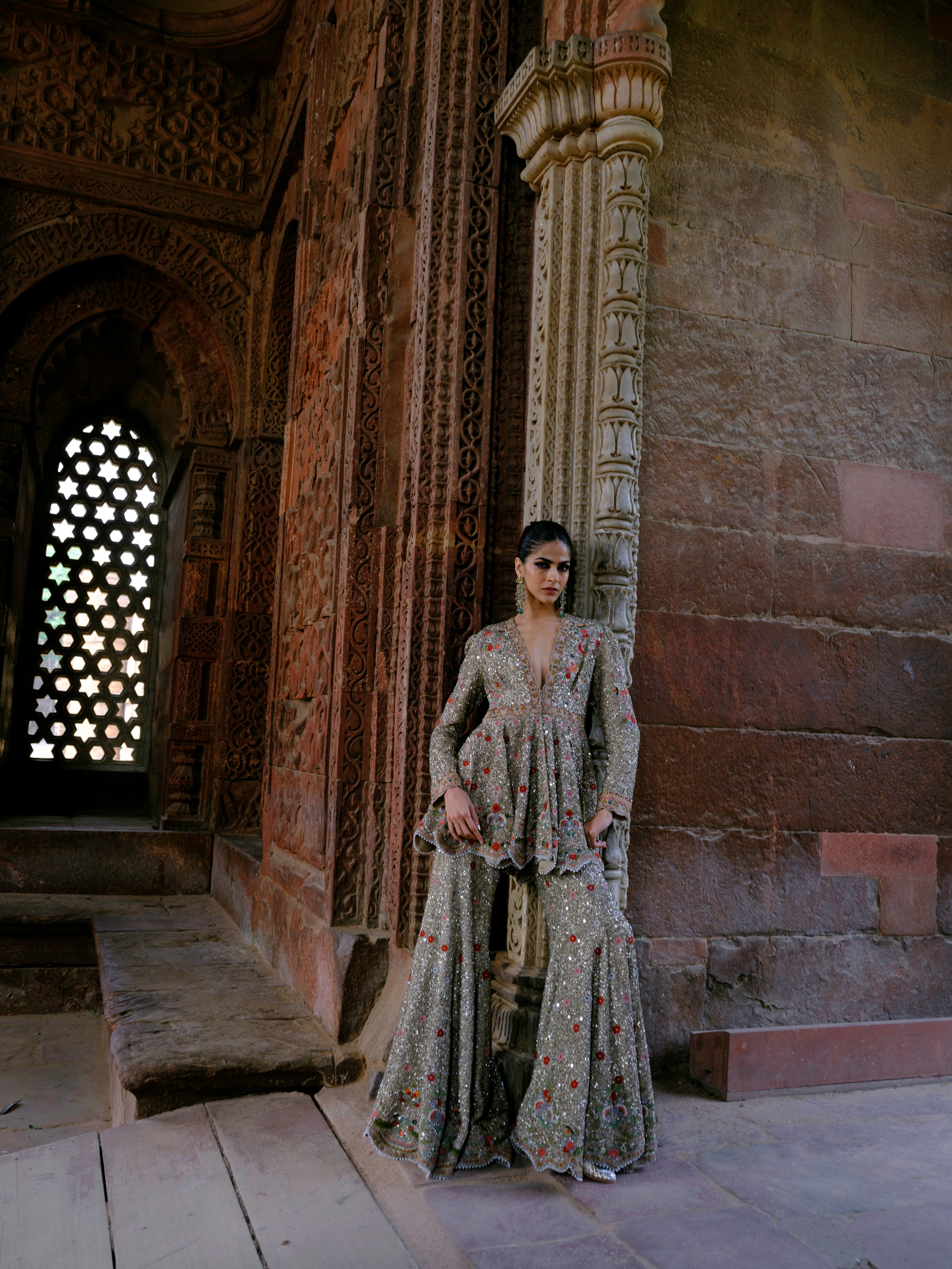 Featuring a peplum in georgette base with zardosi embroidery.