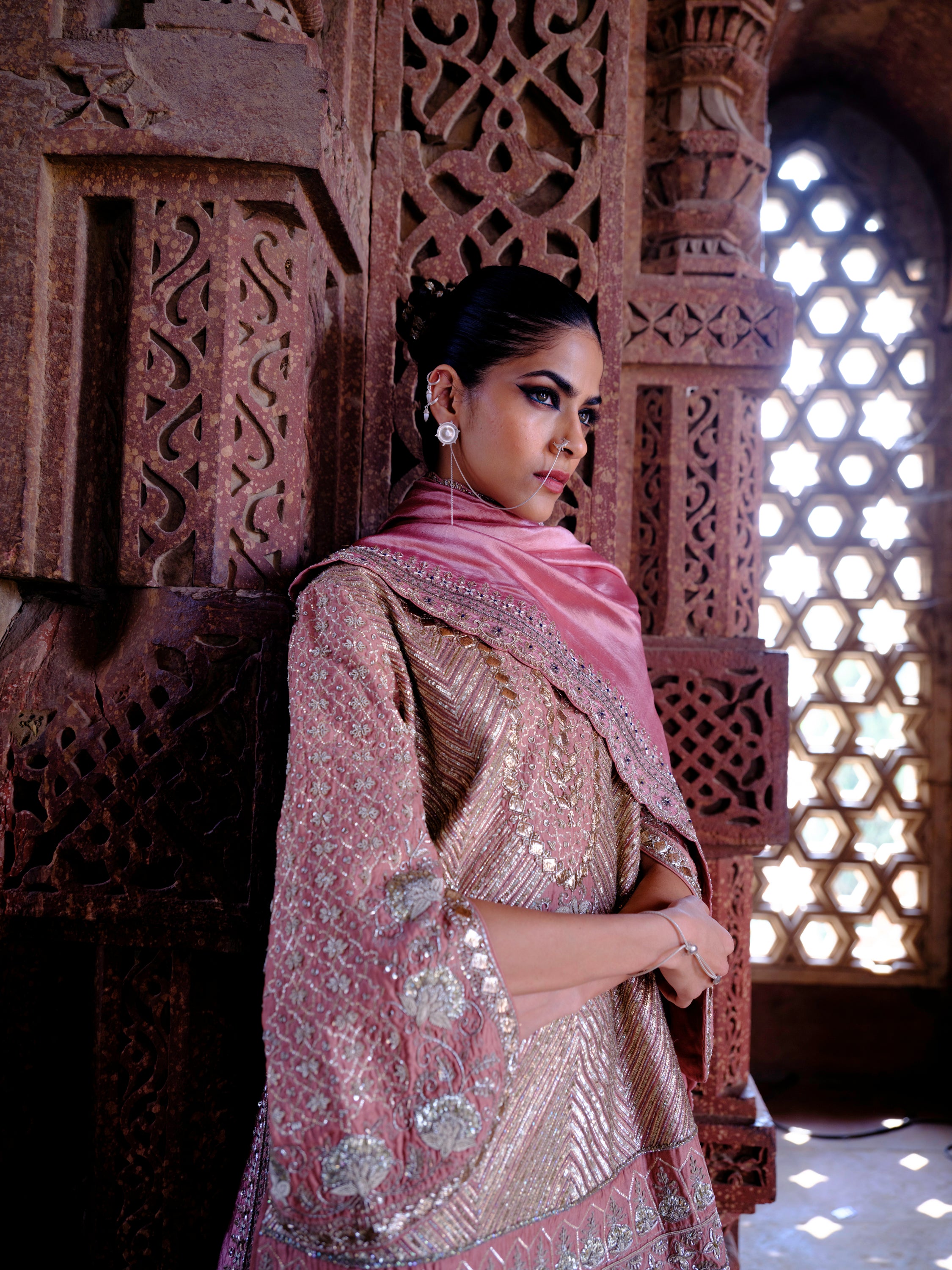Featuring a tuinc in silk base with gotta zardosi embroidery.
