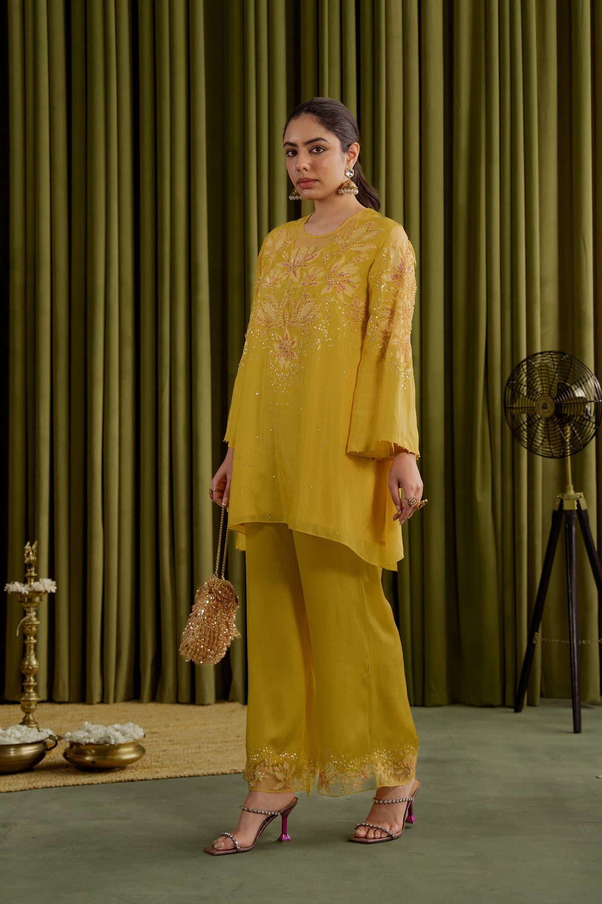 Mango co-ord set with embroidered magnolia flower pattern.