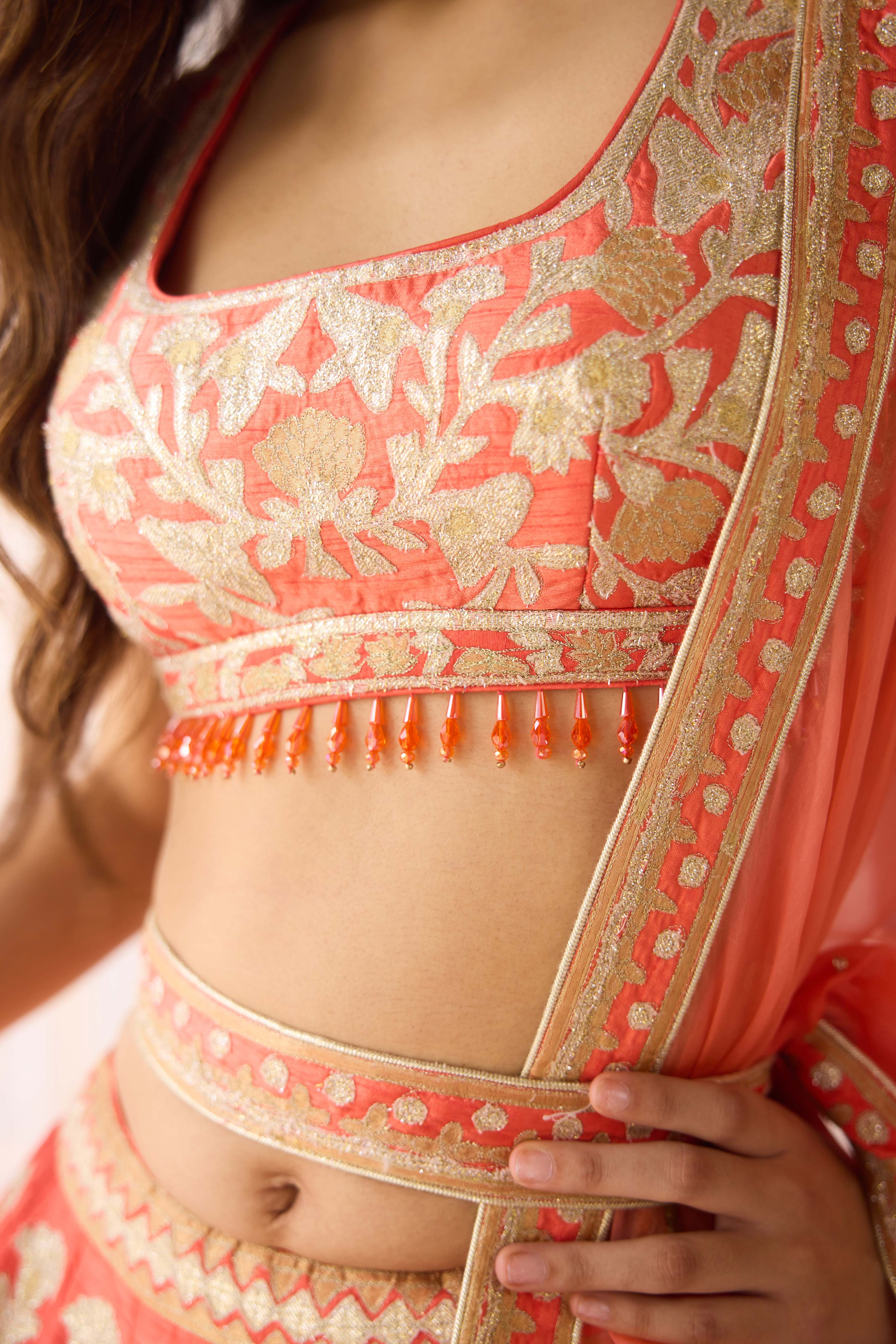 Raw silk coral orange gold applique embroidered lehenga set with organza dupatta