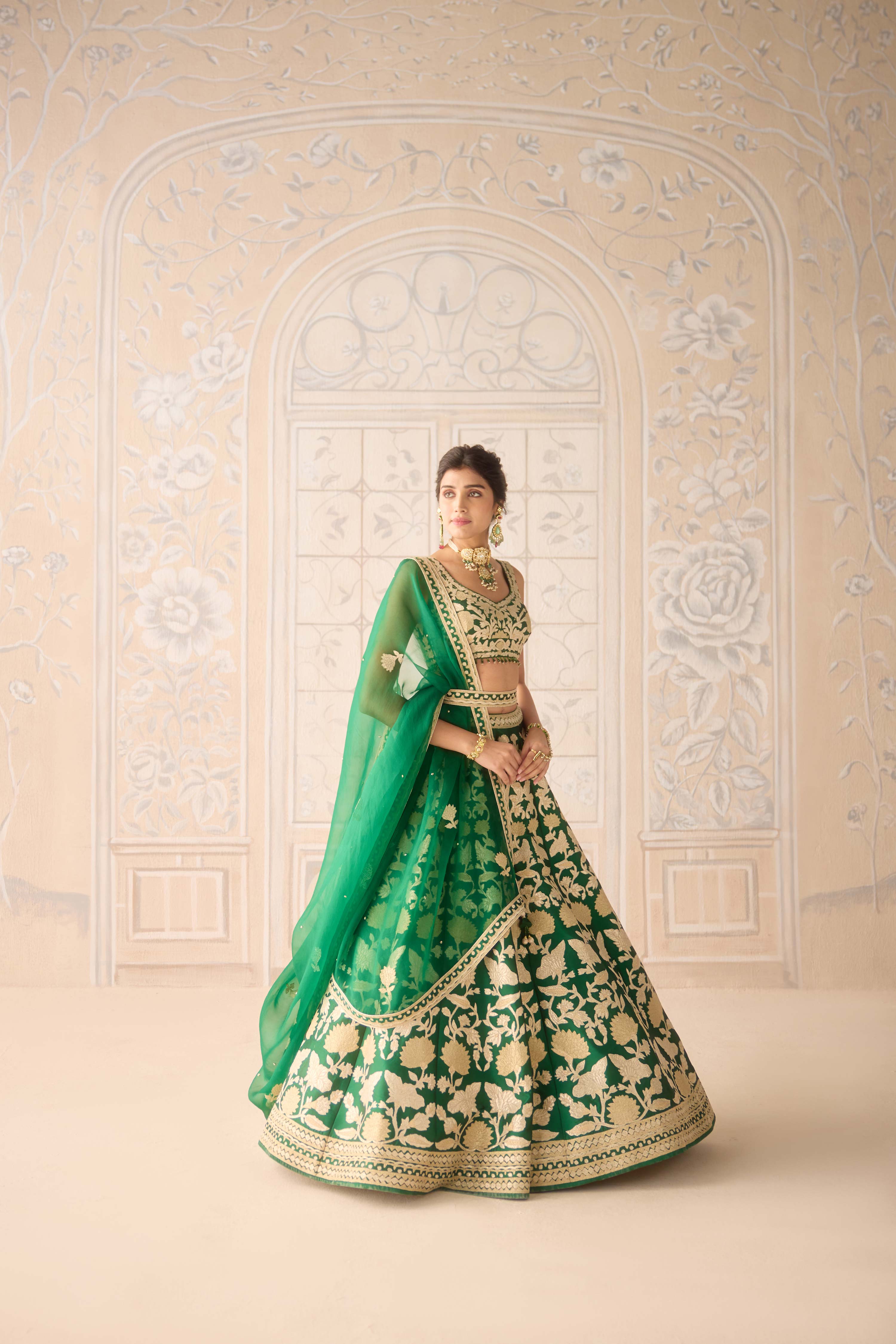 Raw silk dark green gold applique embroidered lehenga set with organza dupatta