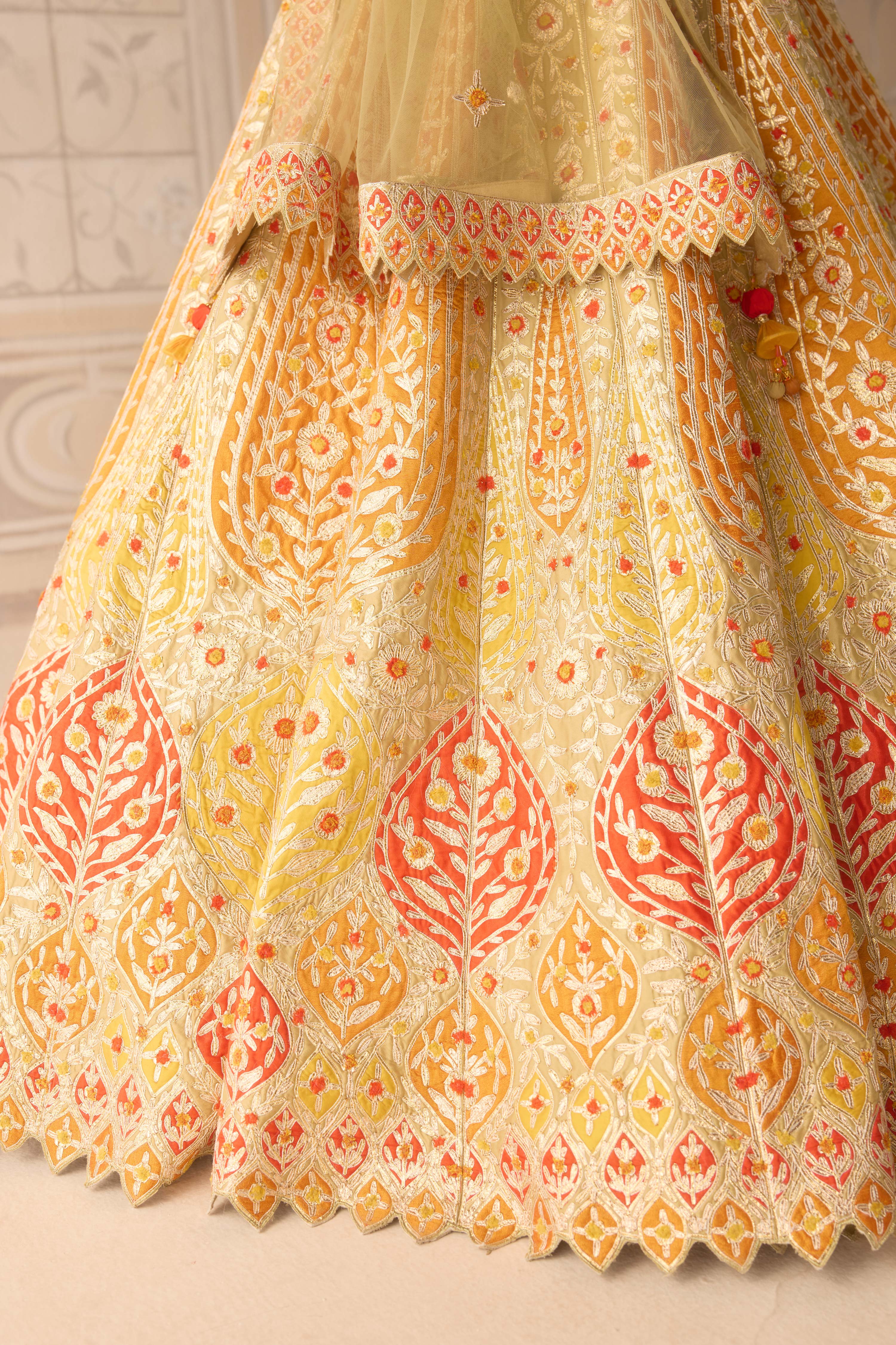 Acacia yellow multi coloured applique and gota embroidered lehenga with organza dupatta
