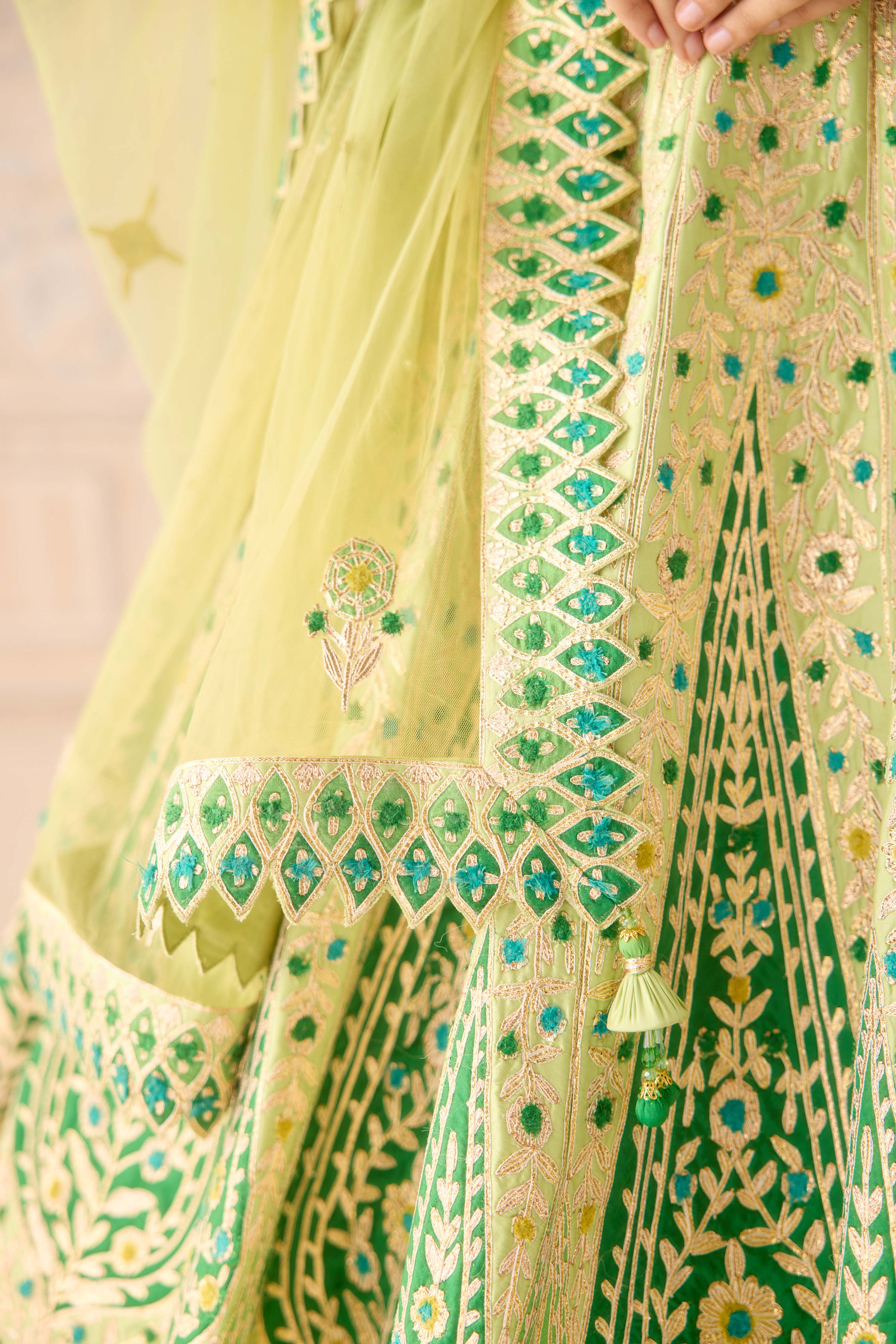 Butterfly green multi coloured applique and gota embroidered lehenga with organza dupatta