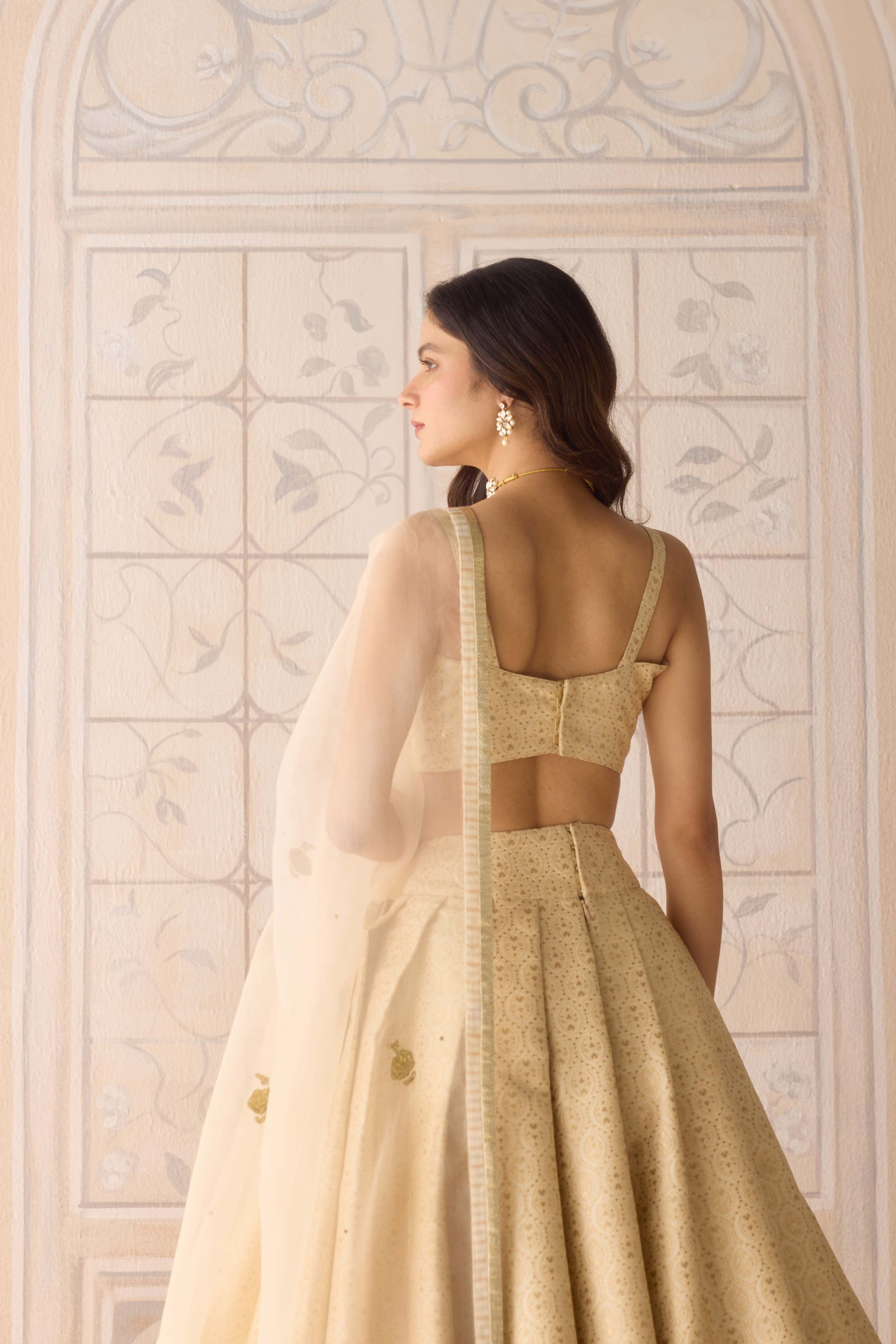 Ivory brocade pleated lehenga with lurex patch dupatta