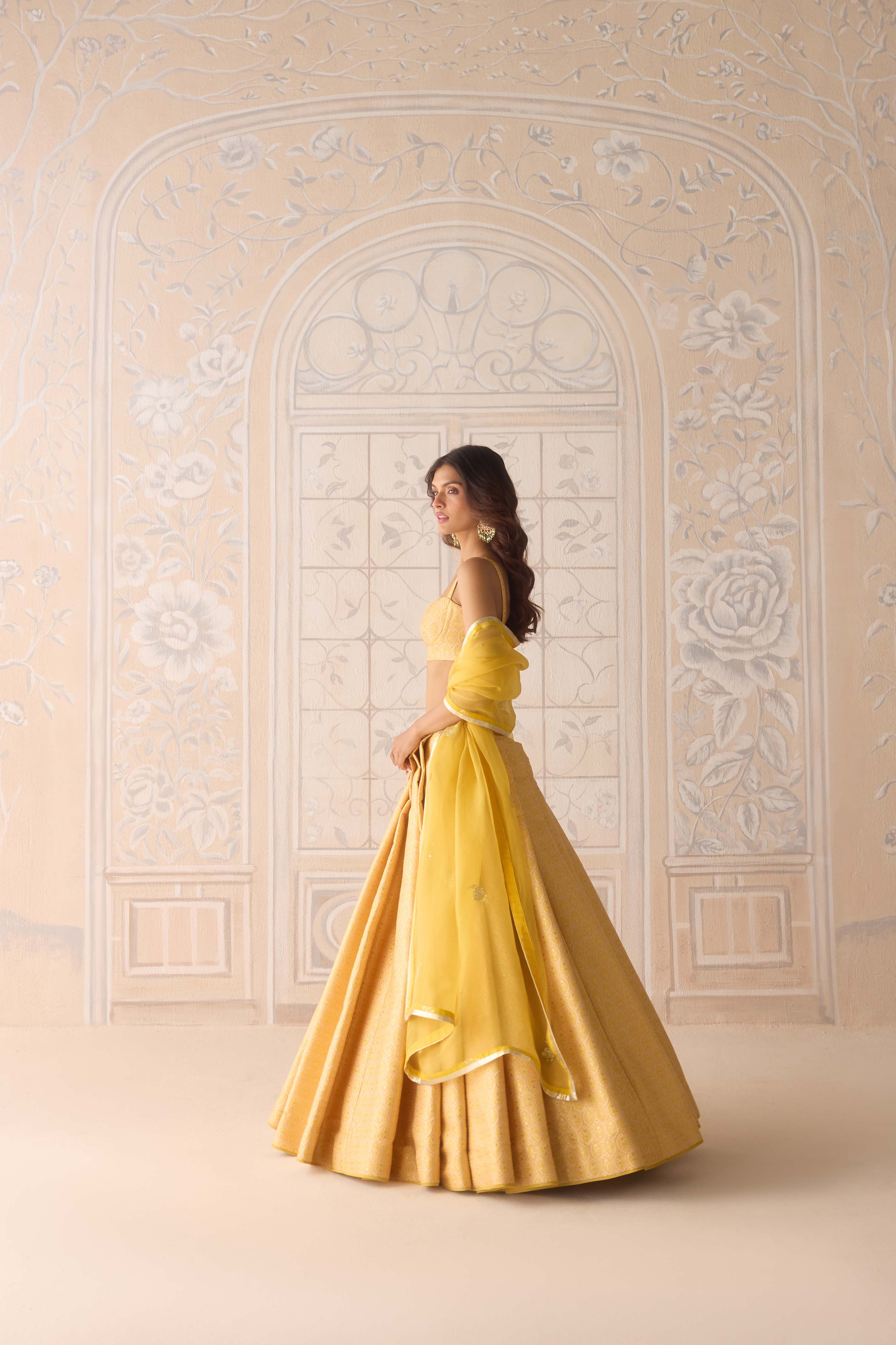 Primrose yellow brocade pleated lehenga with lurex patch dupatta