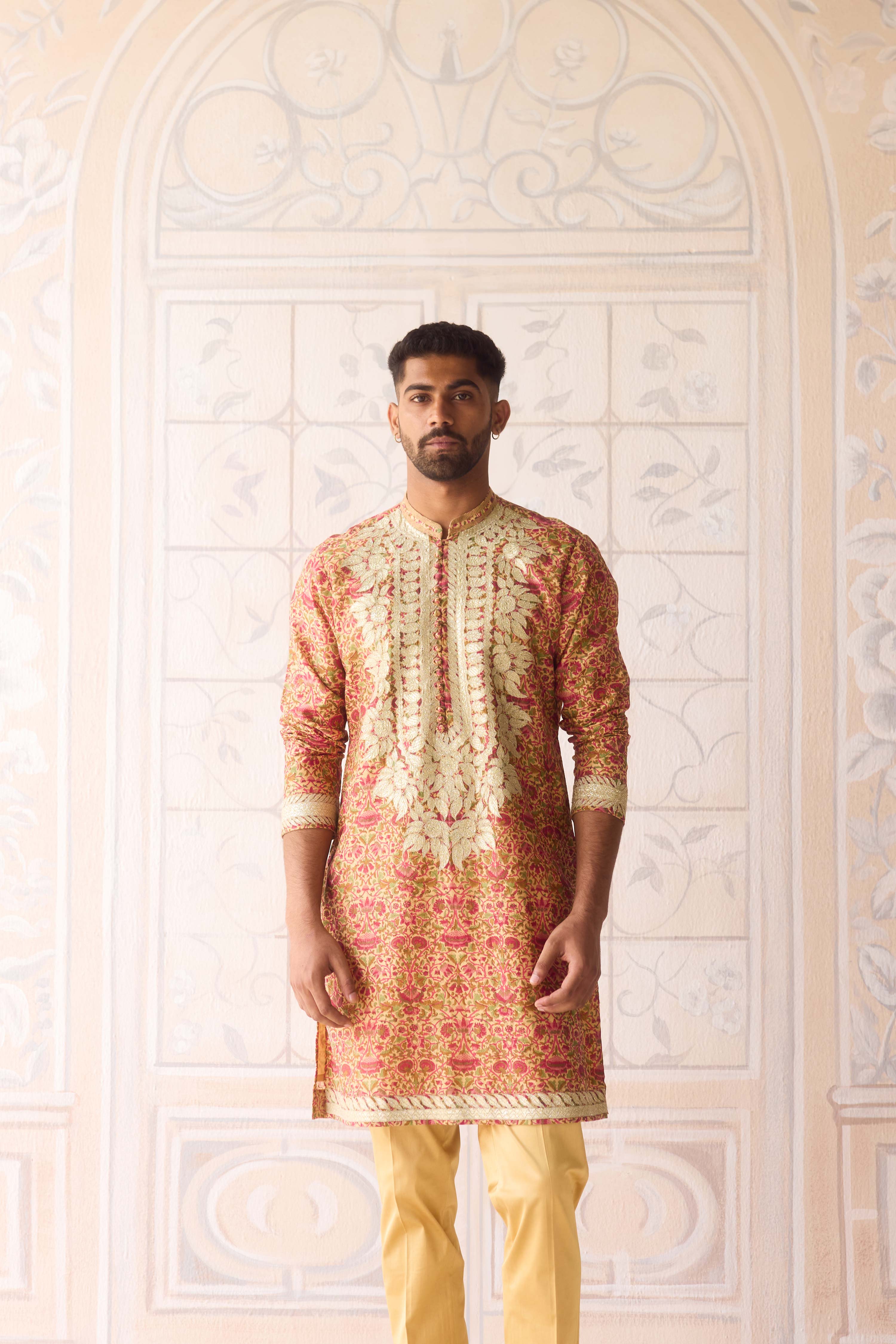 Handblock printed gold applique and thread embroidered kurta paired with embroidered raw silk waist coat